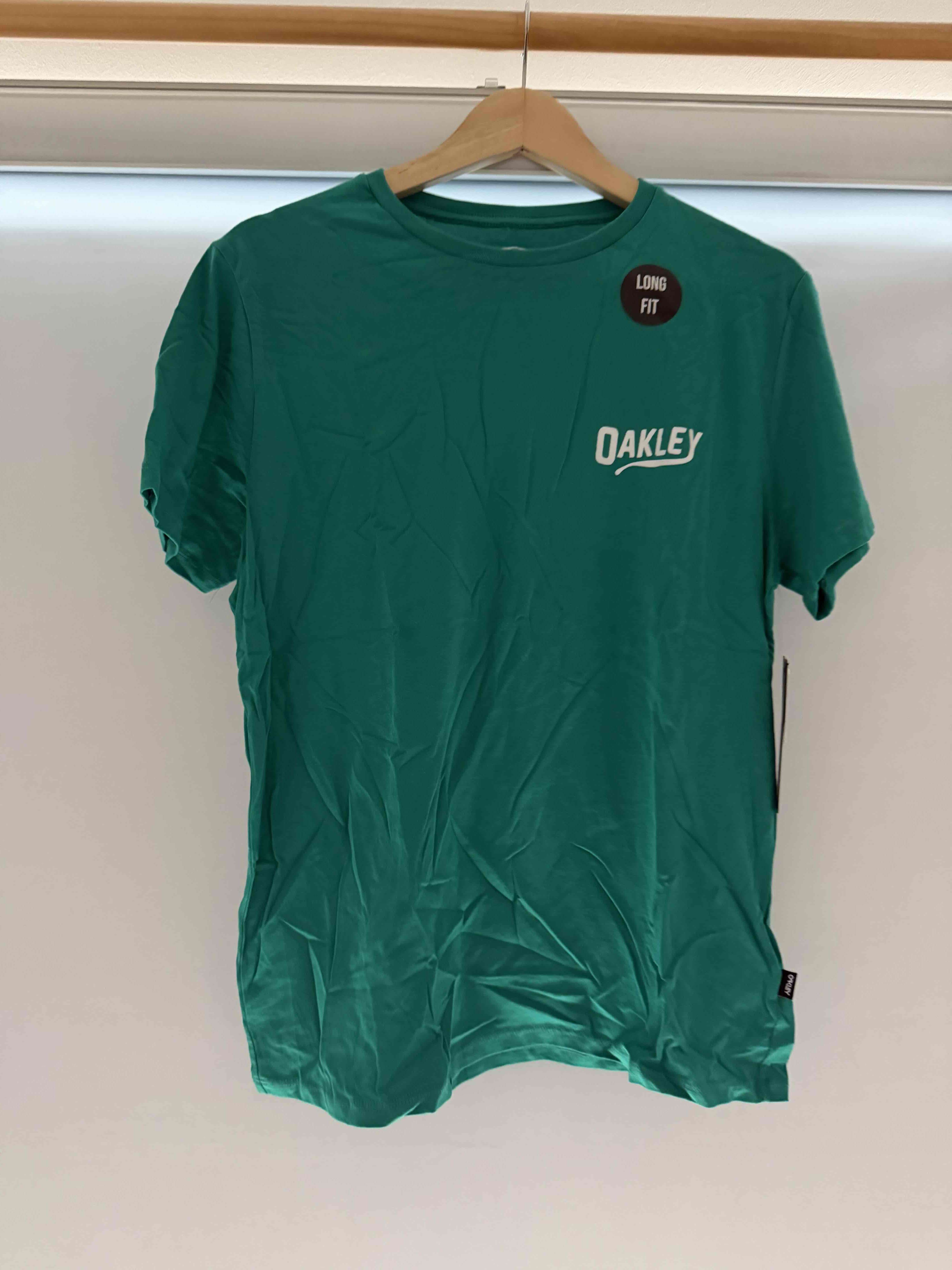 Polera verde Oakley - miniatura 1