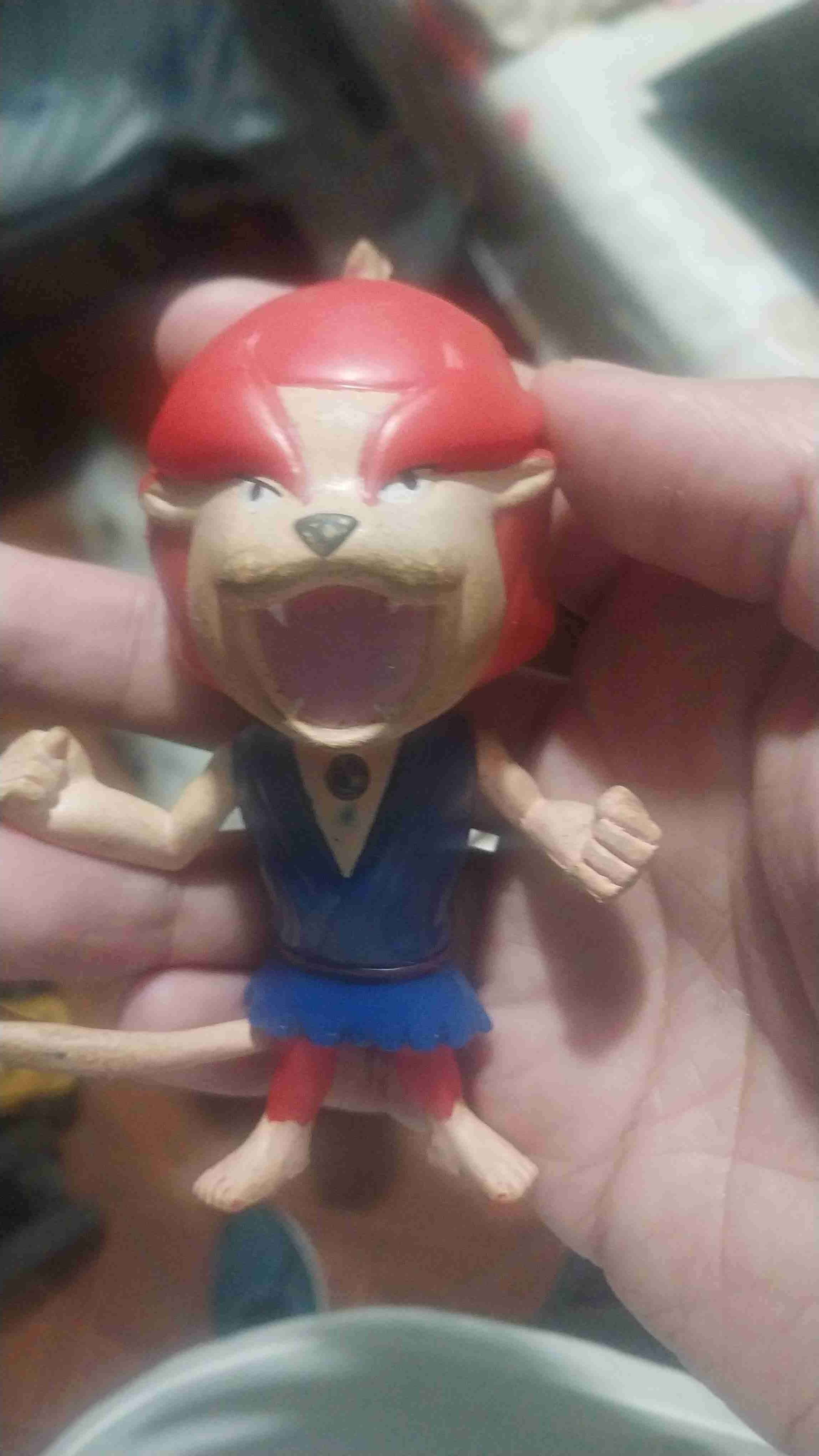 Figura coleccionable de león