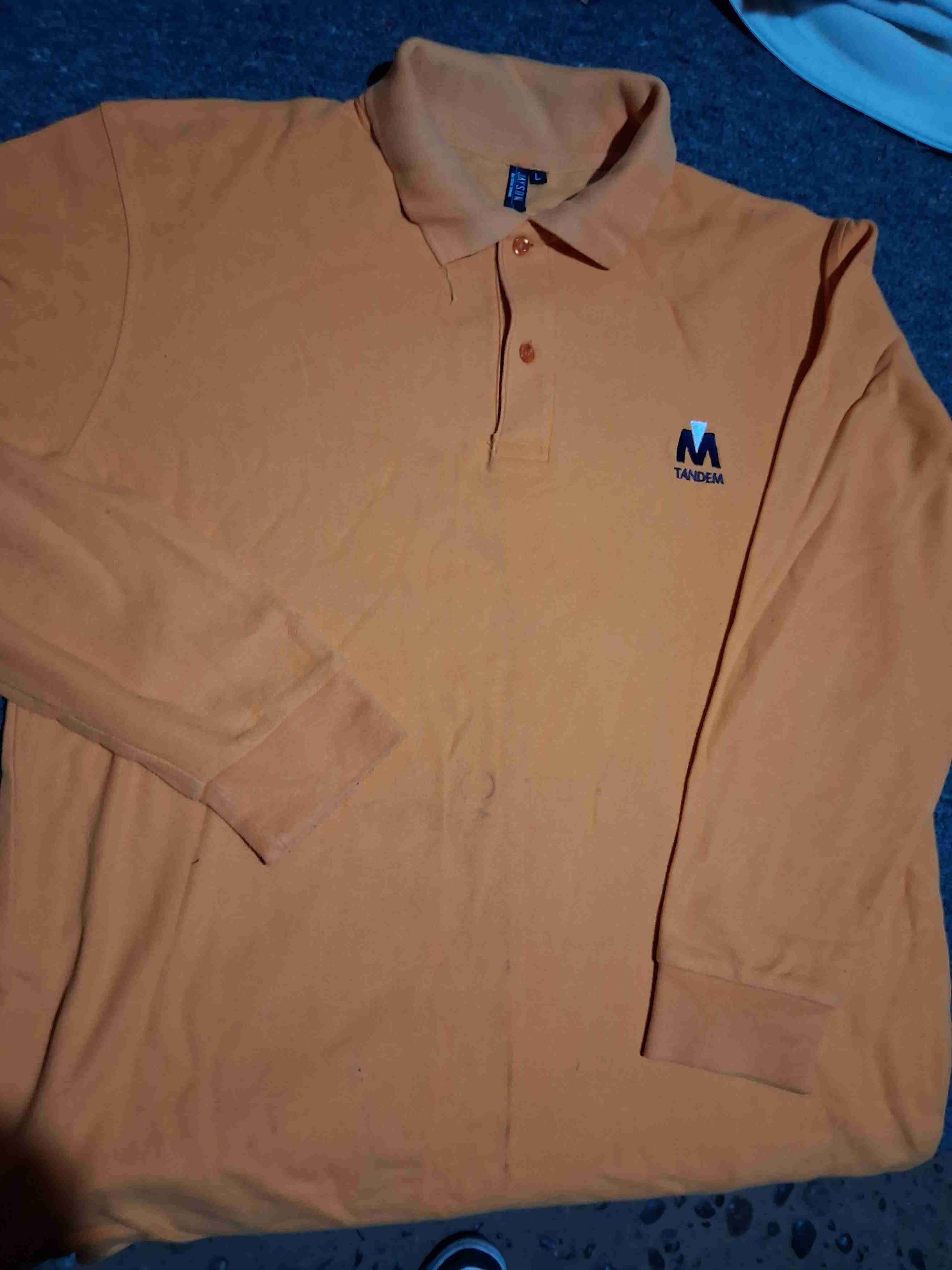 Polera polo naranja Tandem