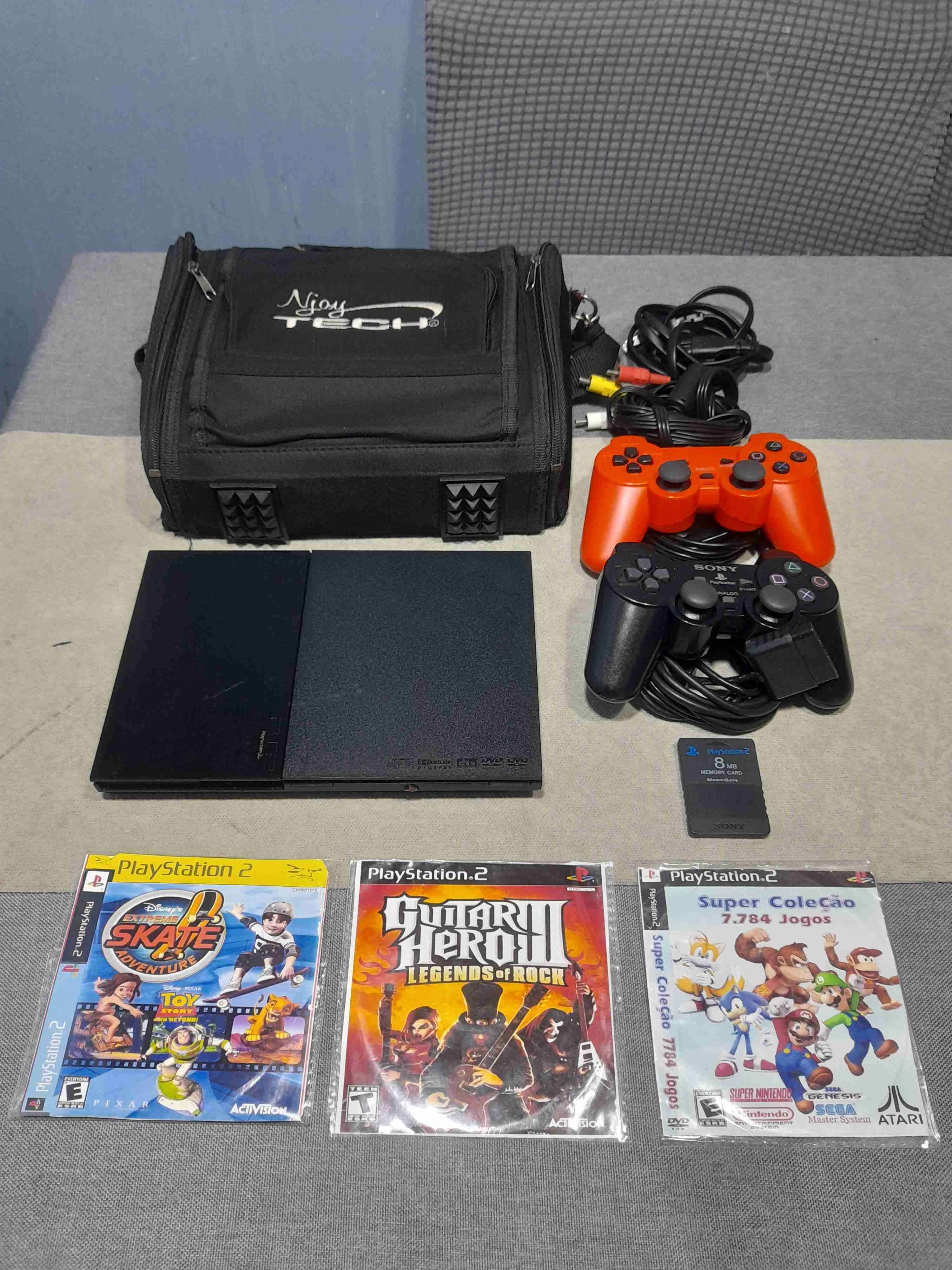 Consola PlayStation 2 con accesorios - miniatura 1