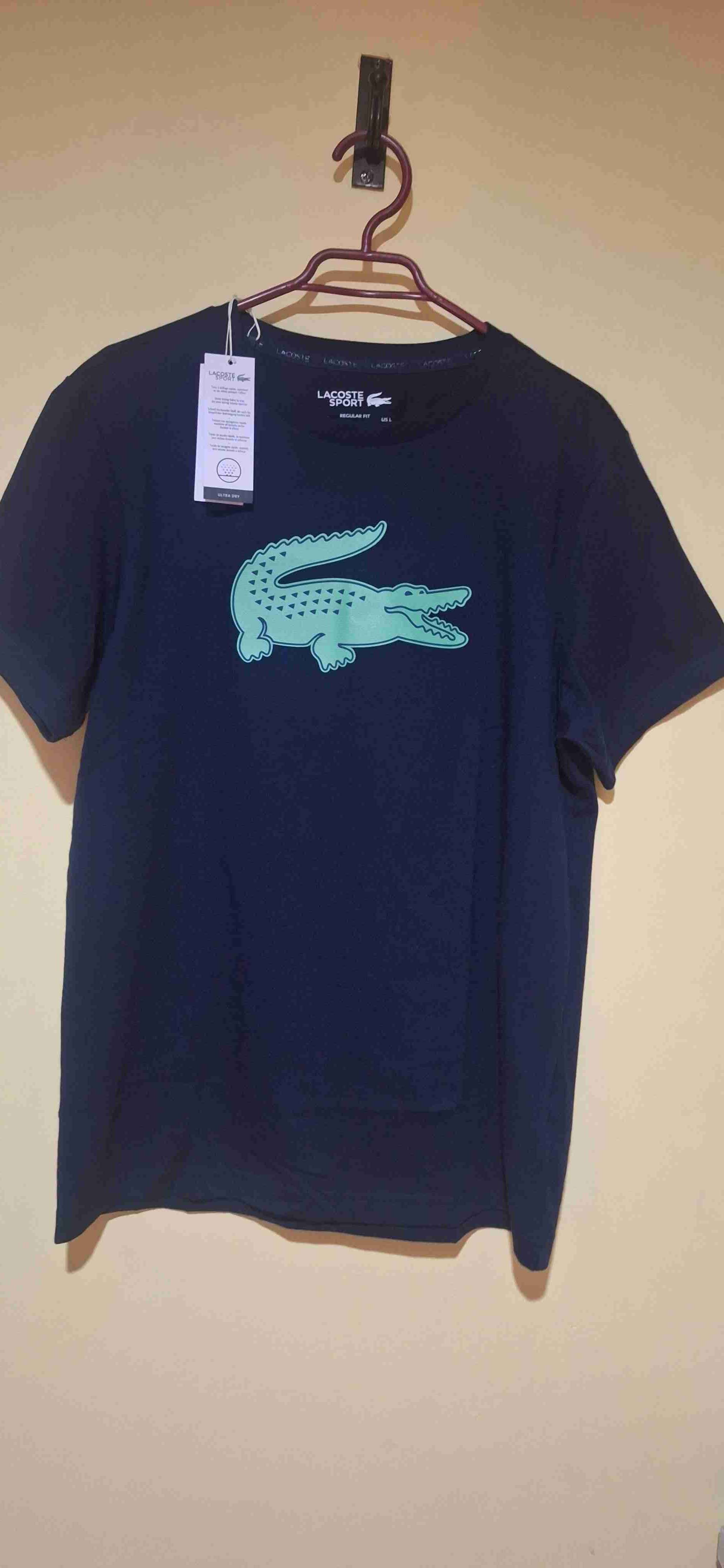 Polera deportiva azul Lacoste - miniatura 1