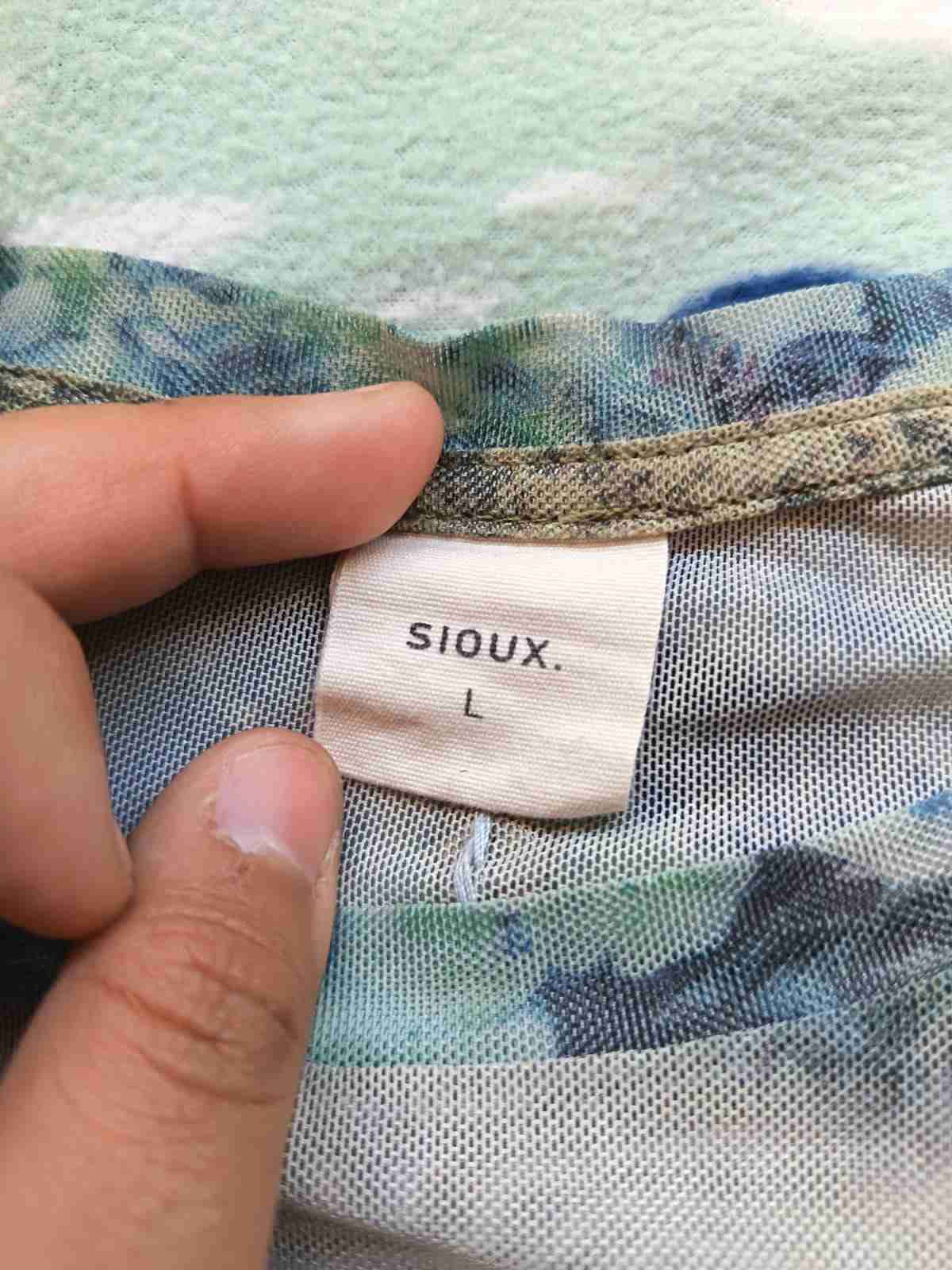 Polera malla estampado paisaje colores pasteles - miniatura 2