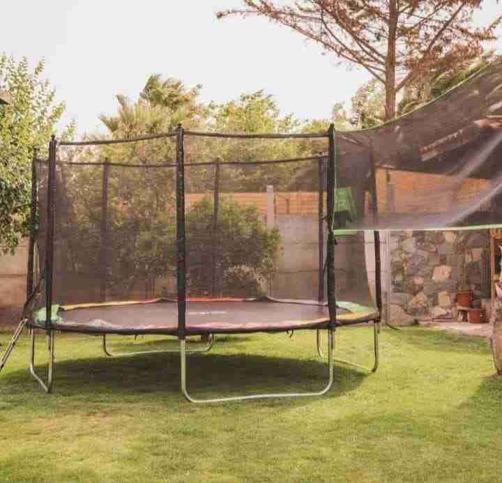 Cama elástica con red de seguridad - miniatura 4