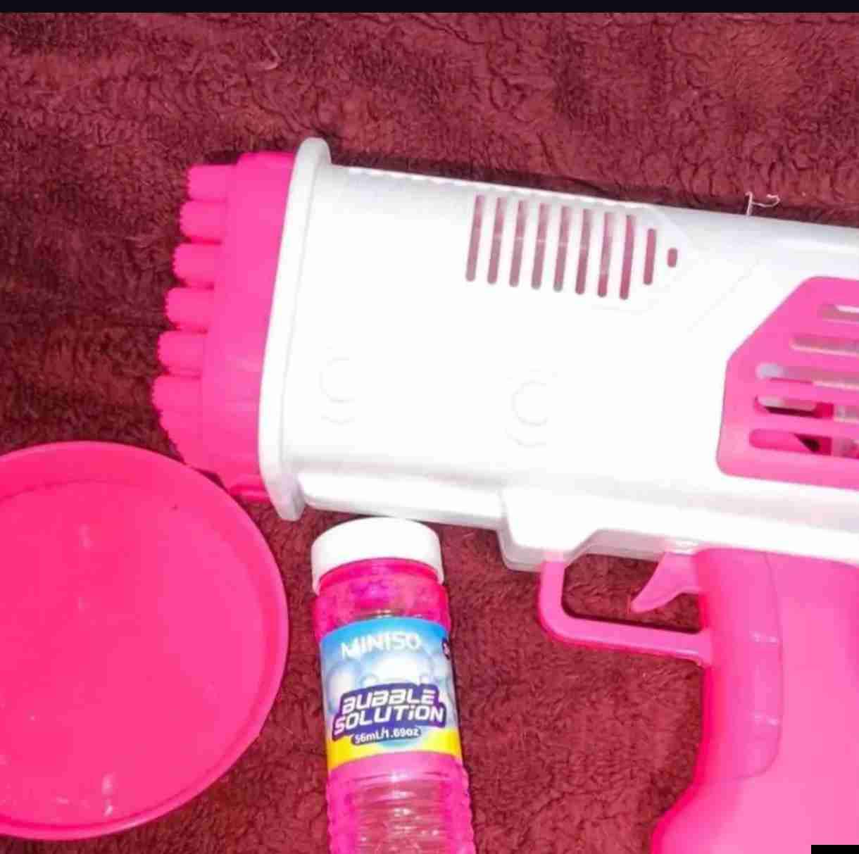 Pistola de burbujas rosa