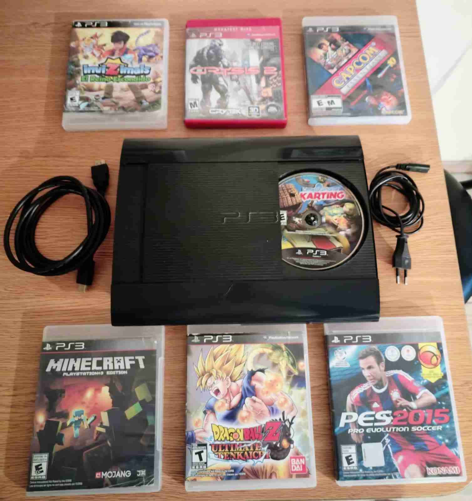 PS3 con 7 juegos incluidos - miniatura 1