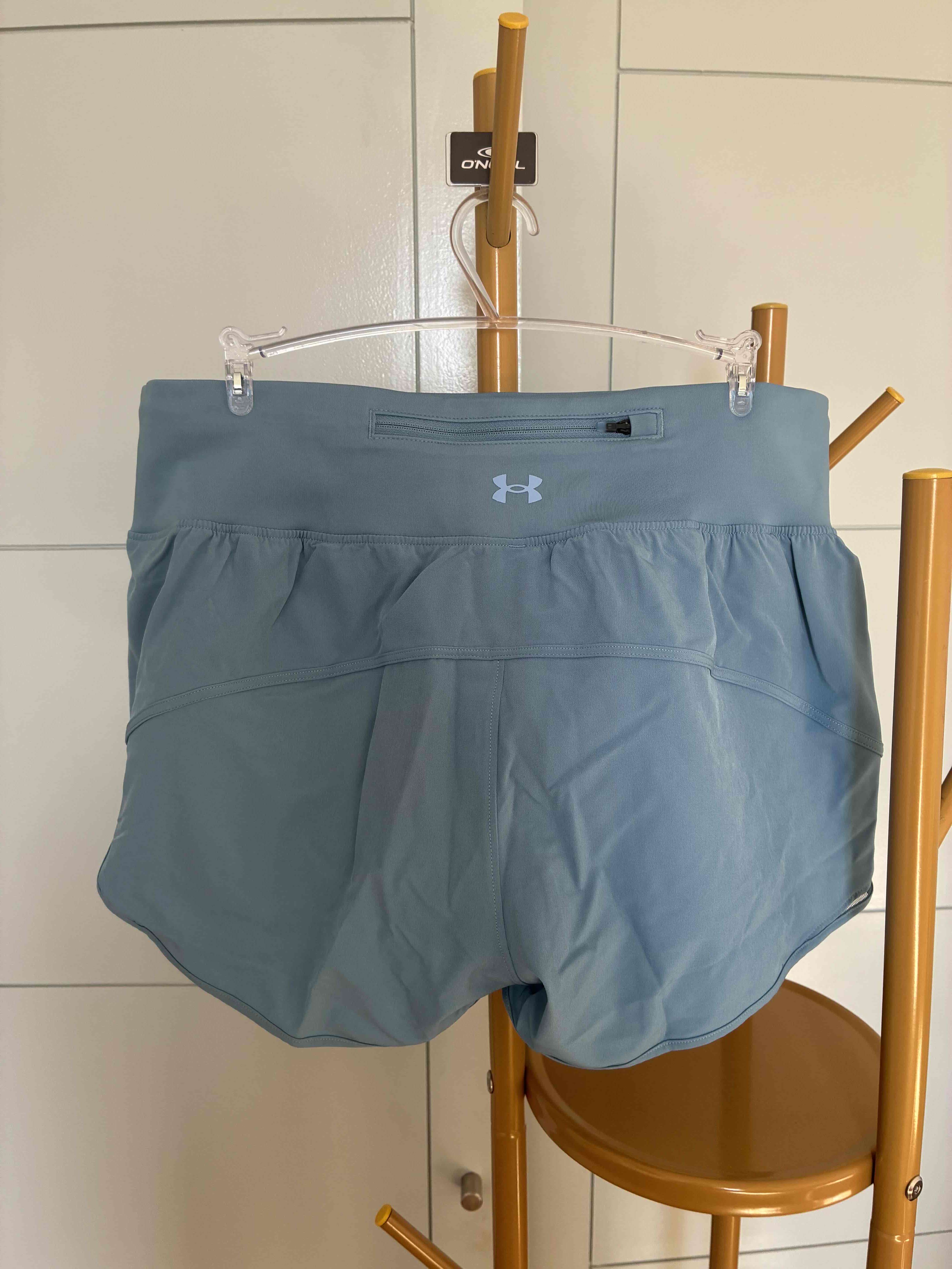 Shorts mujer  deportivos celeste Under armour - miniatura 3