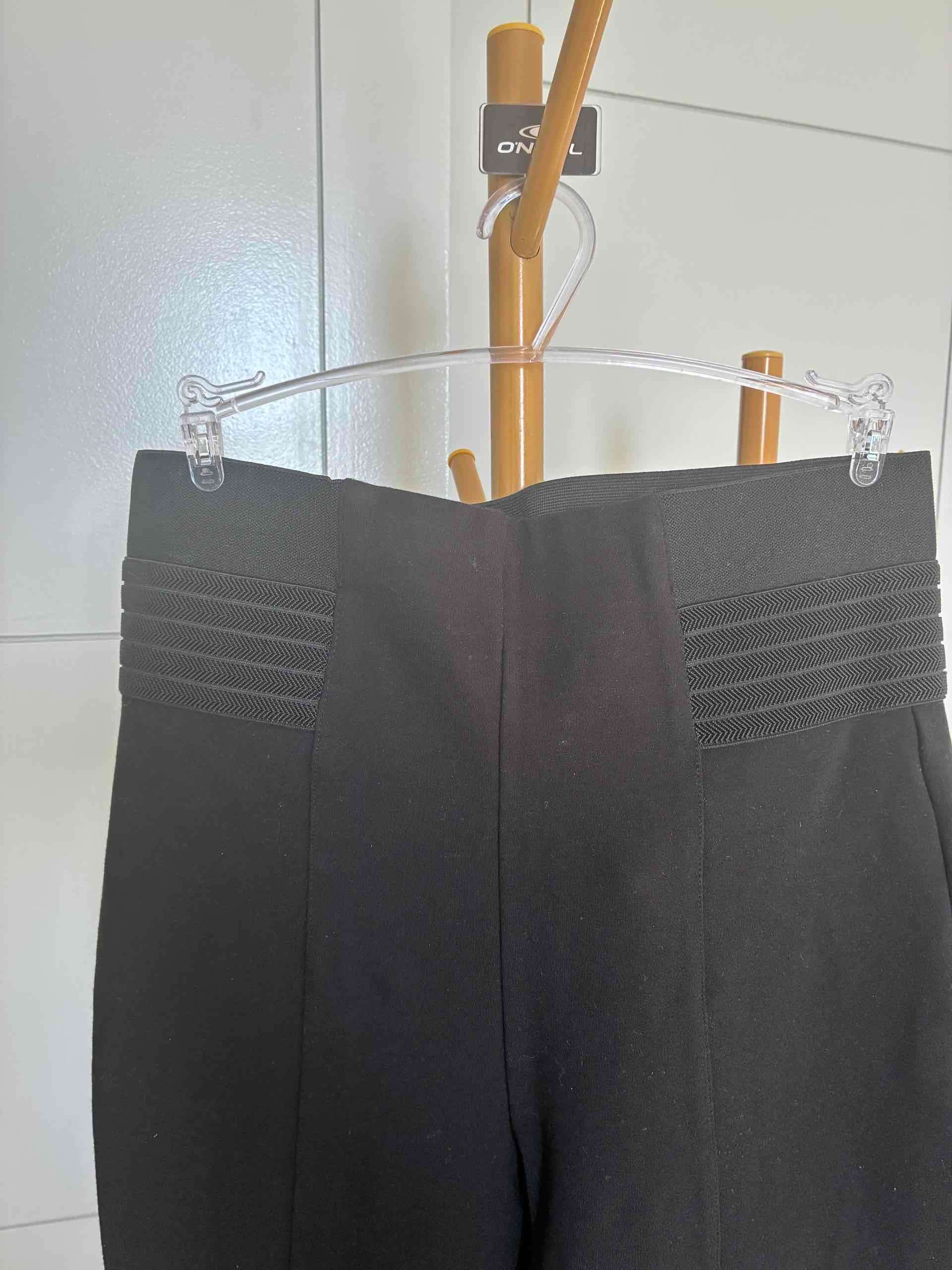 Pantalones negros elegantes para mujer - miniatura 3