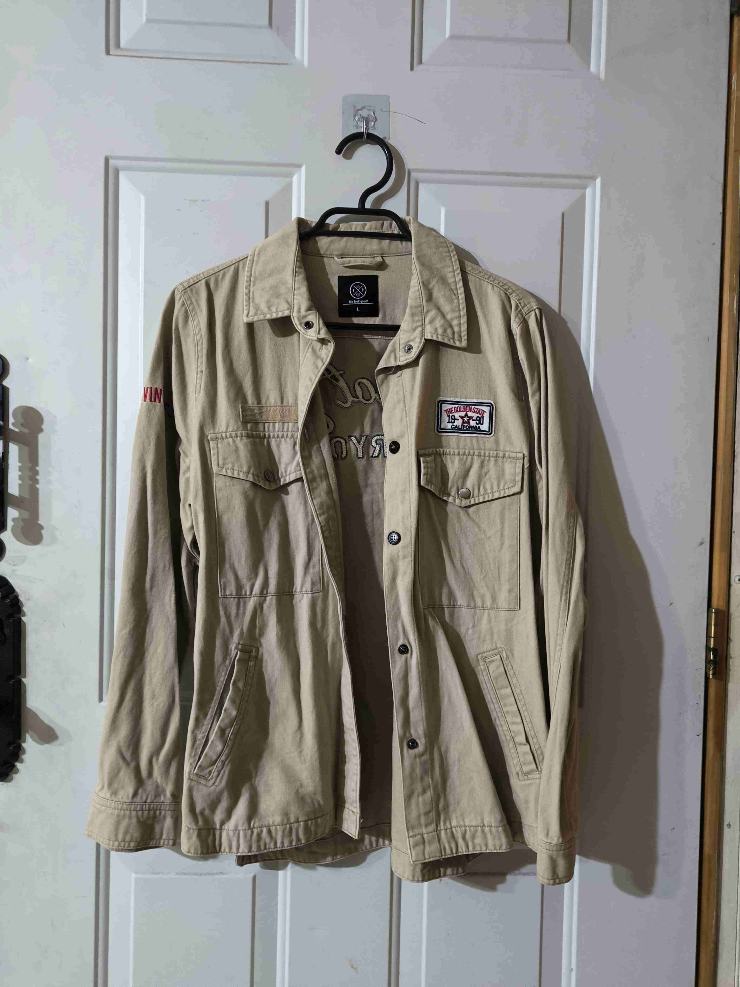 Chaqueta beige con parches - miniatura 1