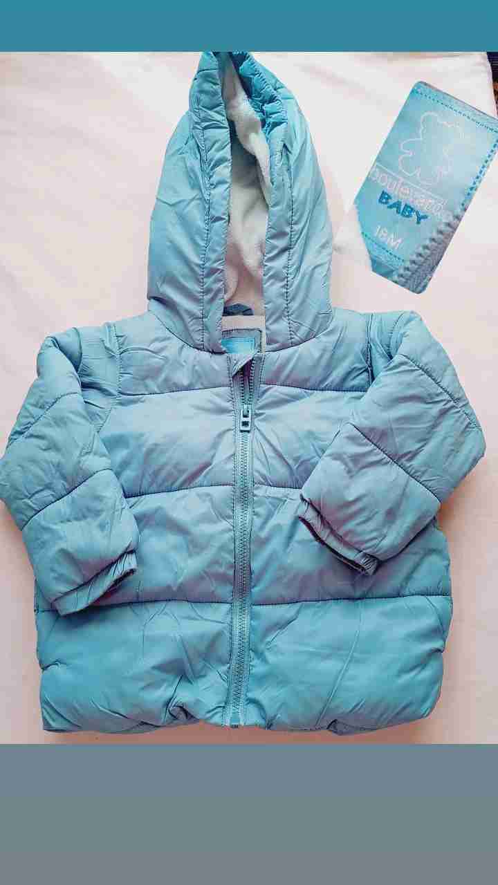 Chaqueta celeste de bebé