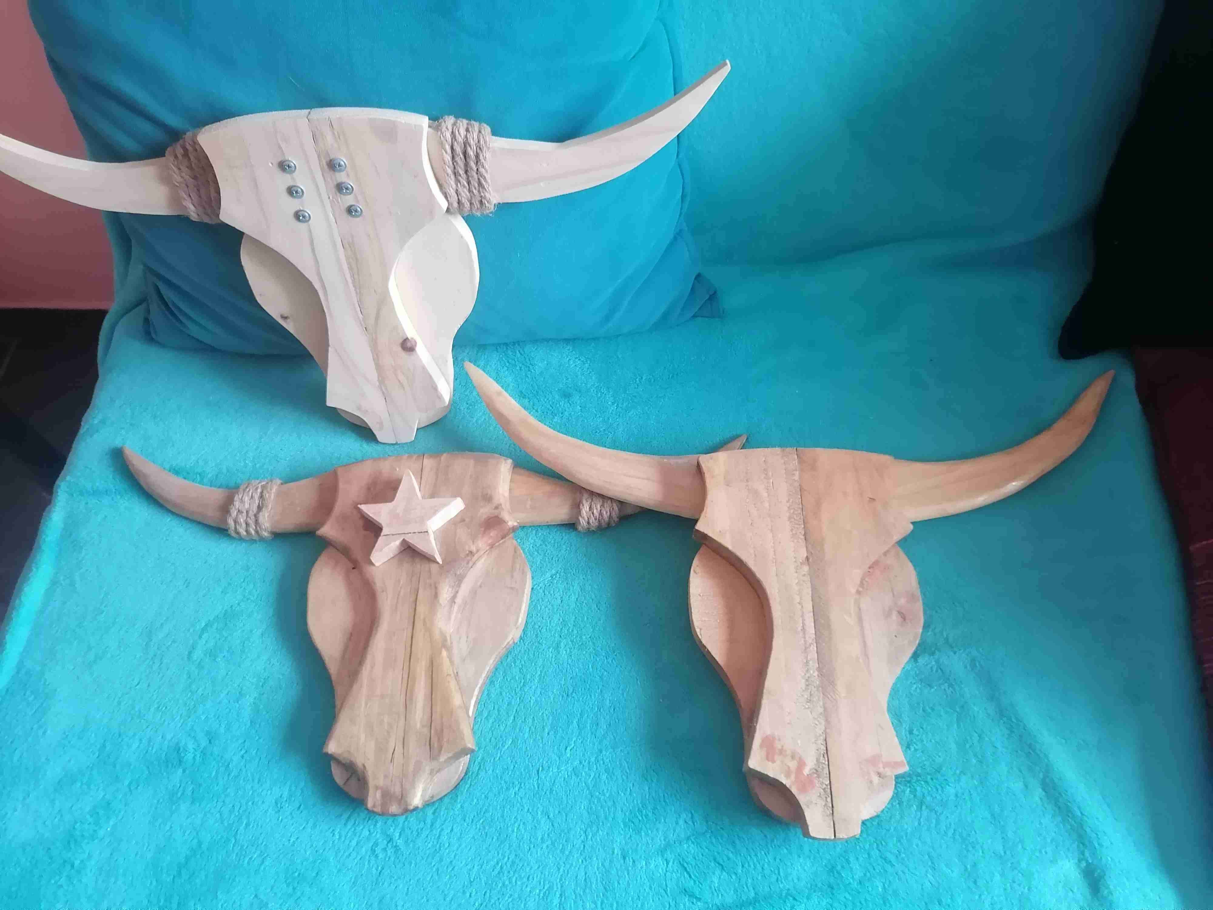 Cabezas decorativas de madera