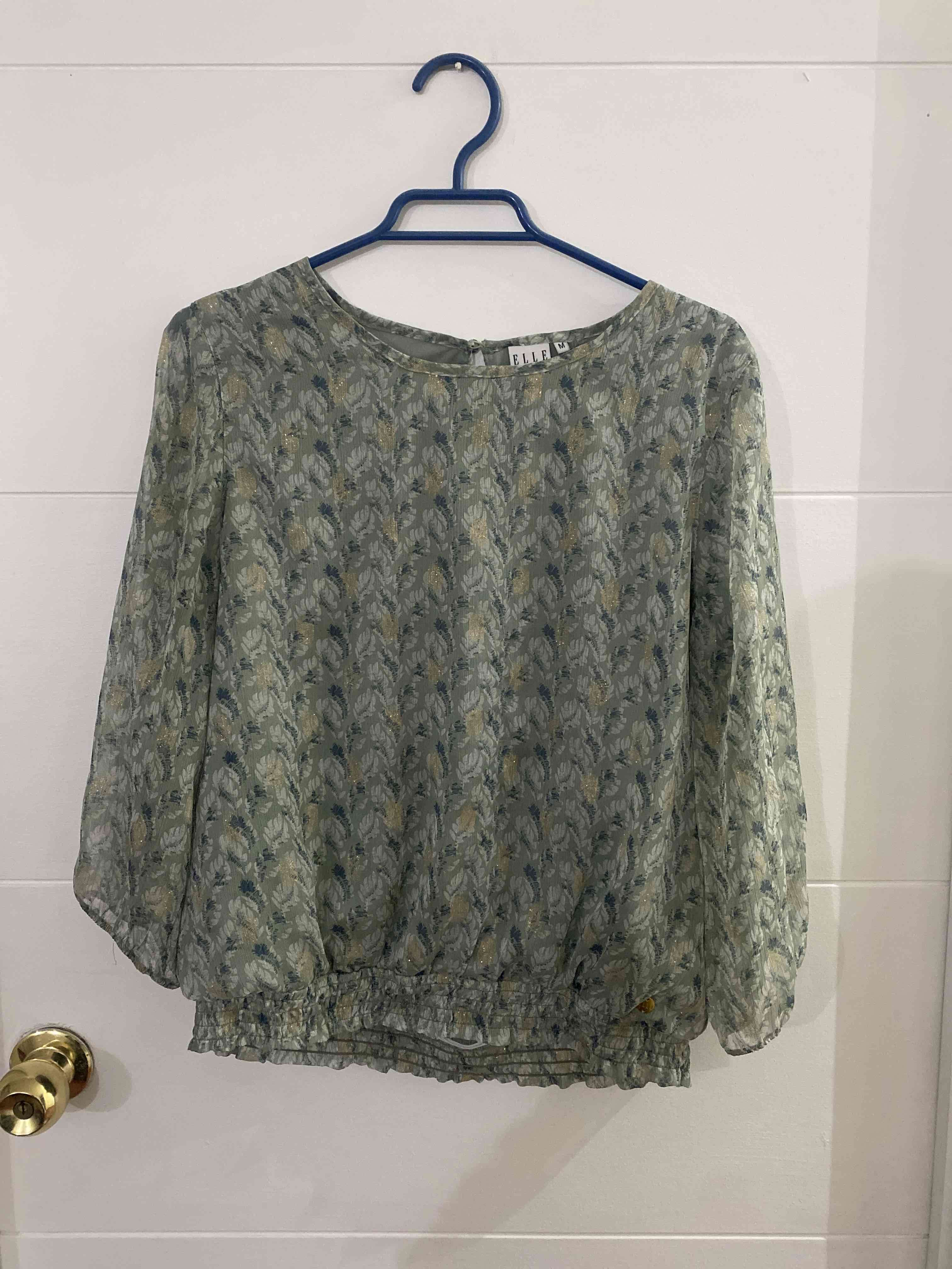Blusa estampada en tonos verdes - miniatura 1