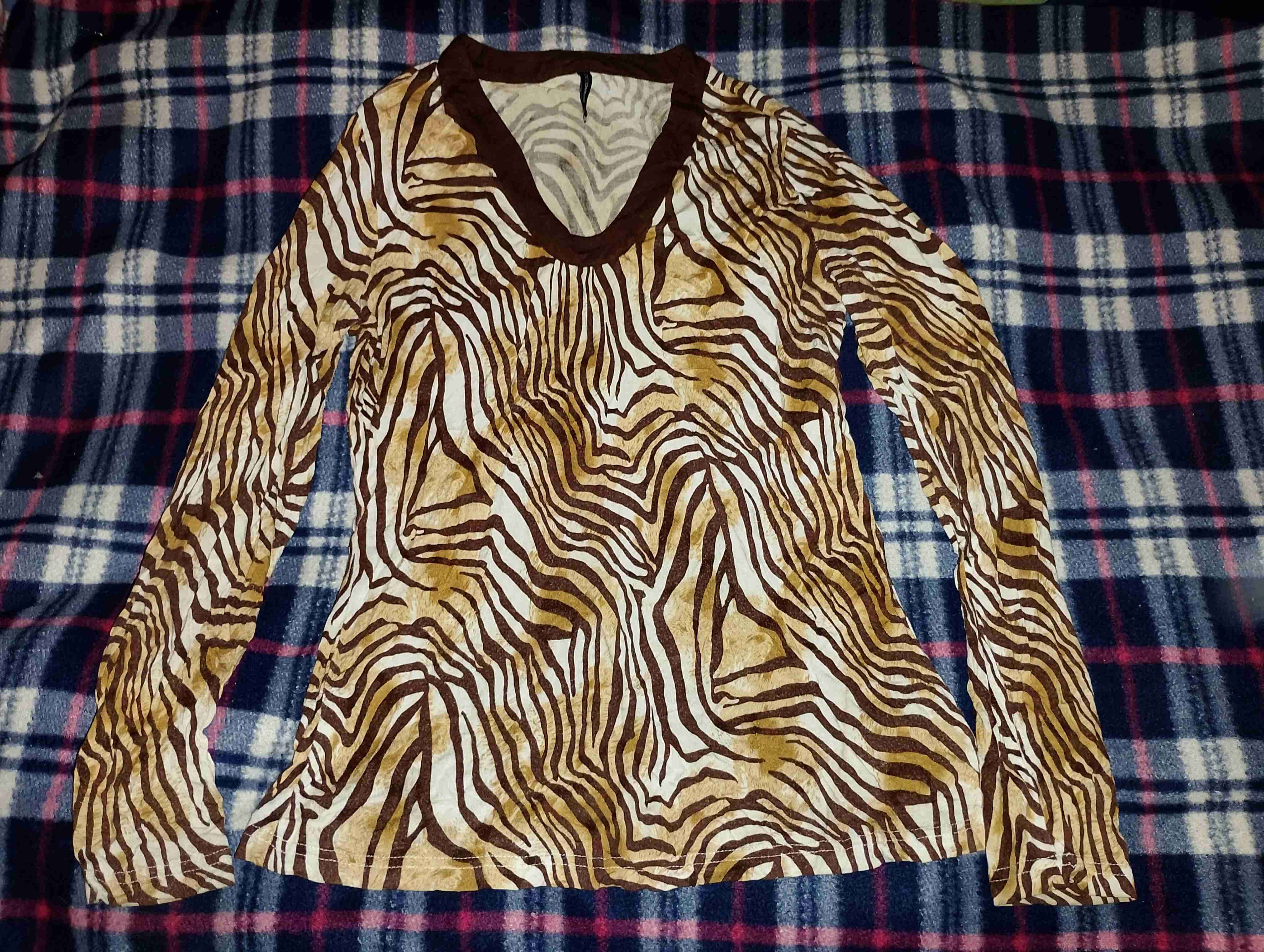 Blusa de manga larga animal print