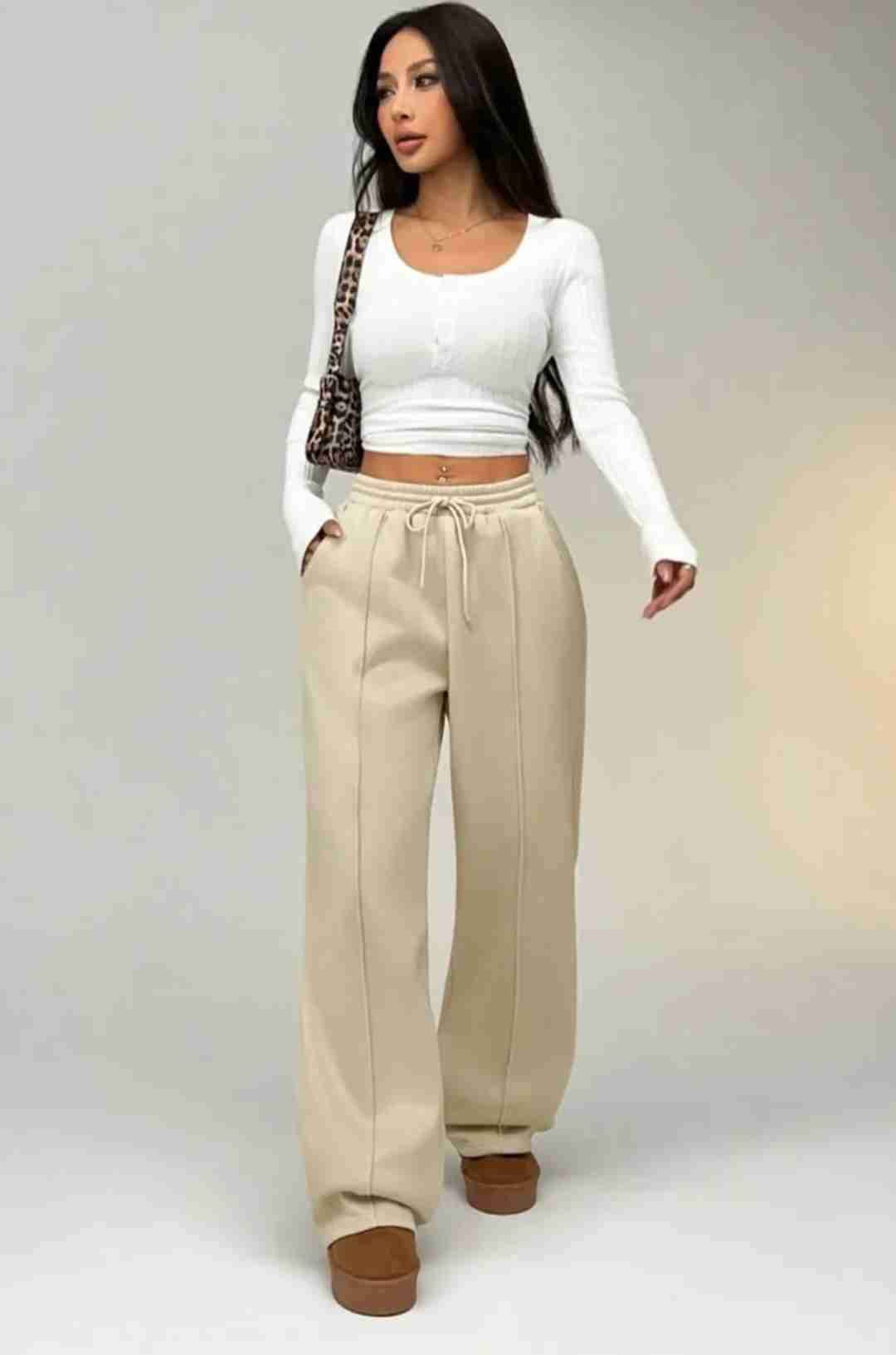 Pantalones beige anchos - miniatura 1