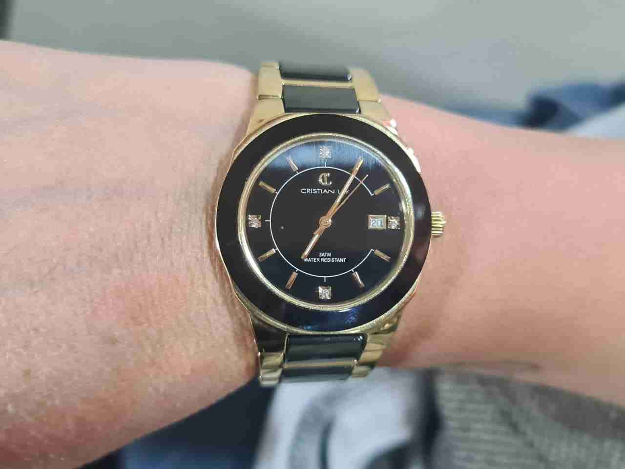 Reloj dorado elegante Cristiani