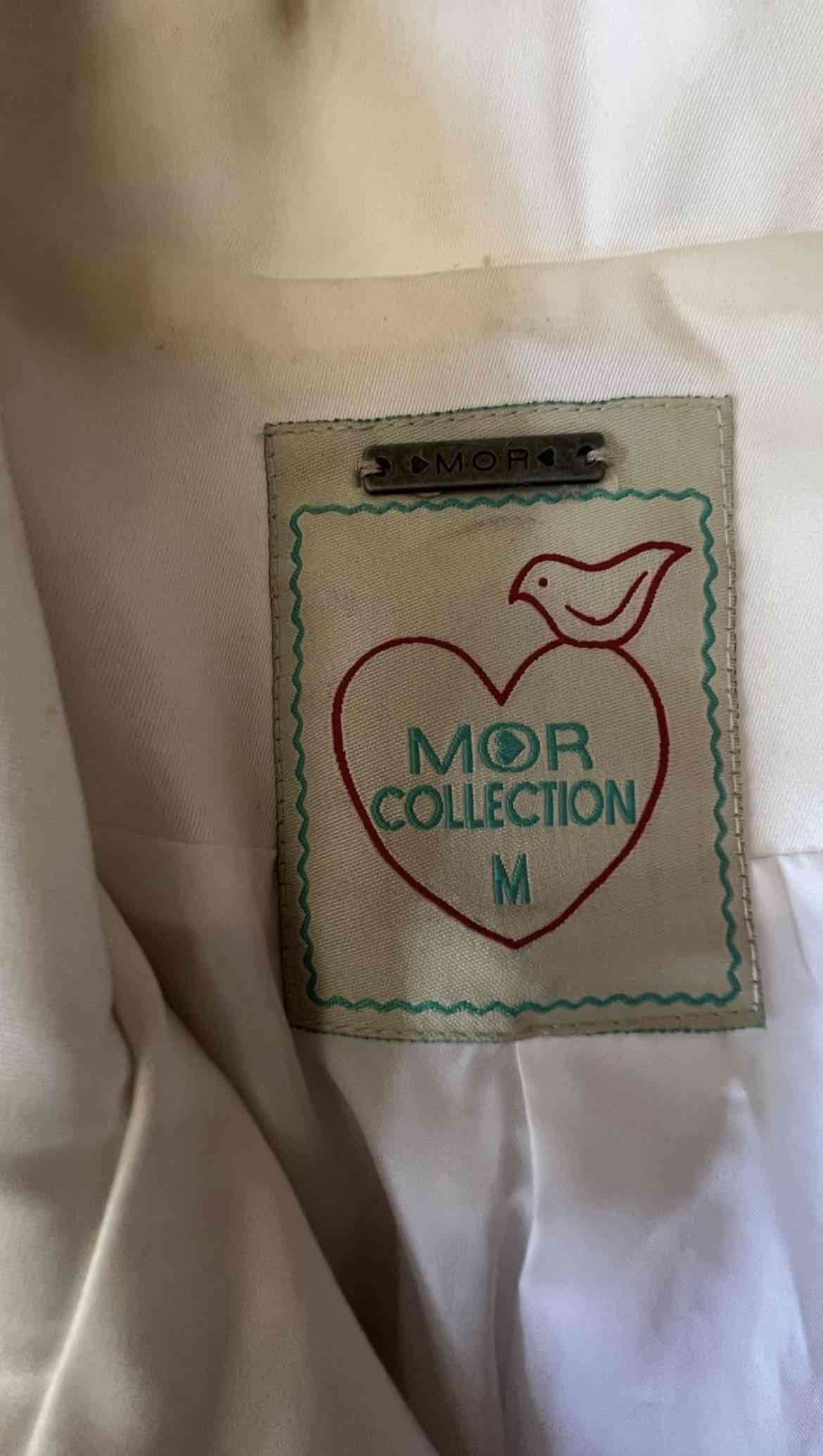 Abrigo blanco con ribetes negros - miniatura 2