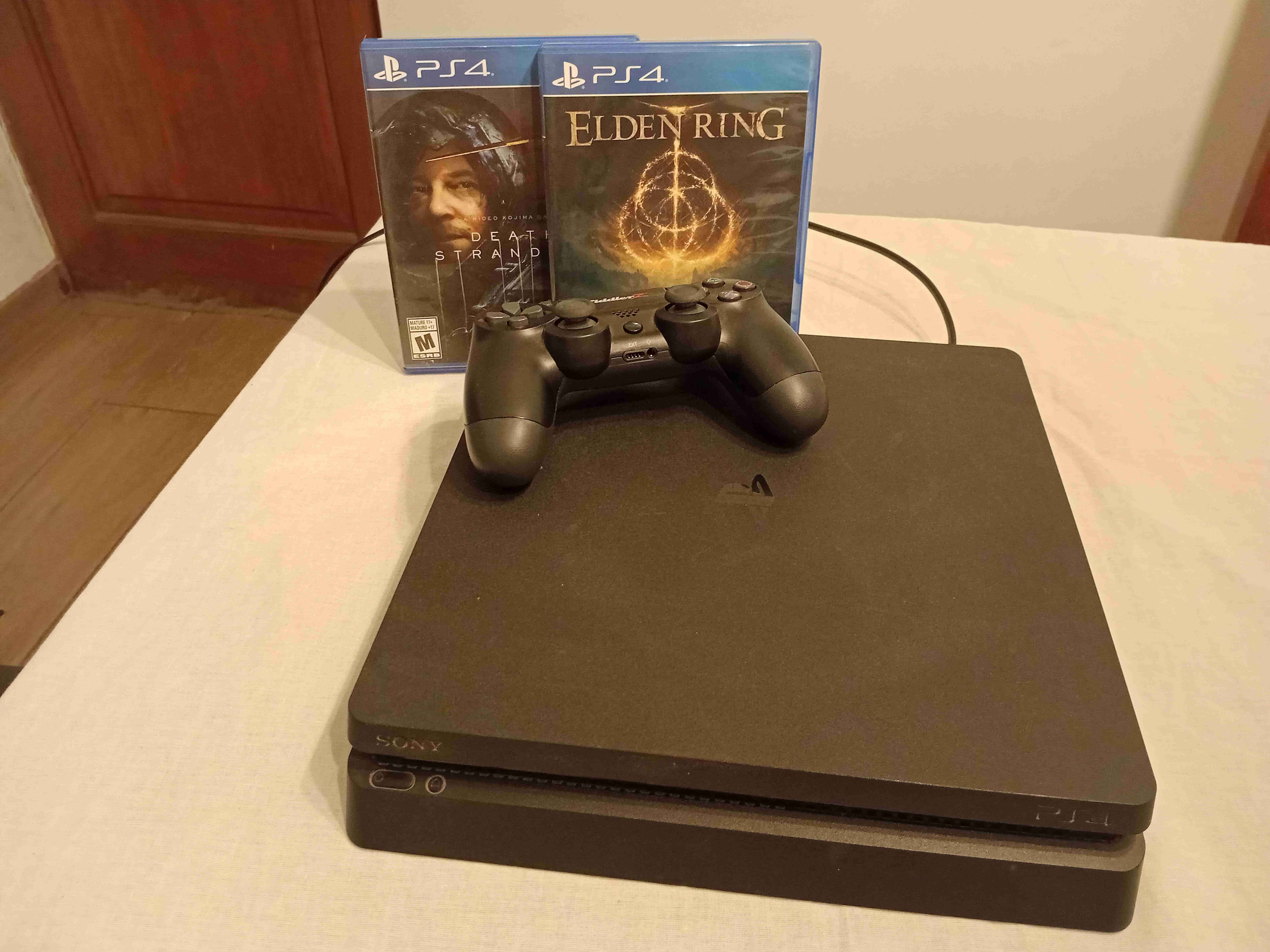 Consola PS4 SLIM 1TB con juegos (CONVERSABLE) - miniatura 1