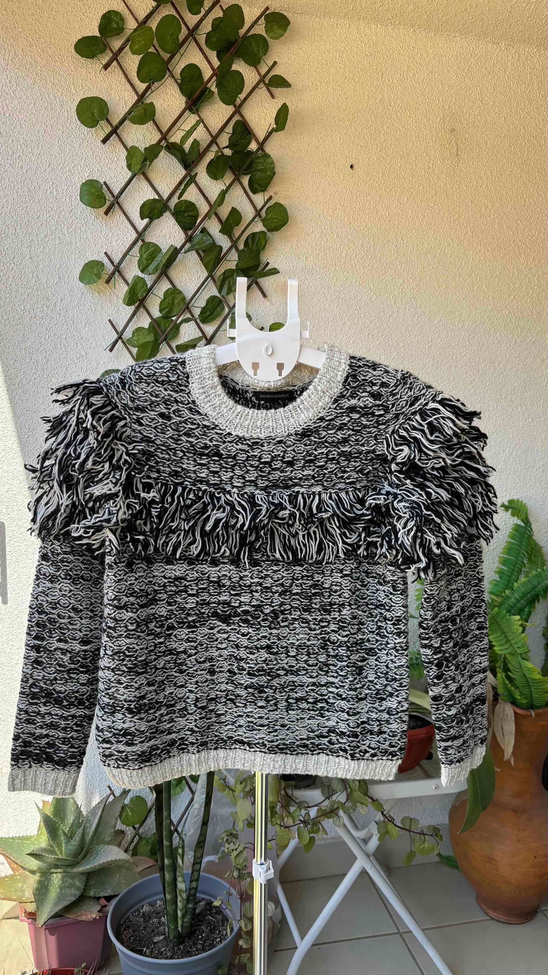 Suéter de lana con flecos - miniatura 1