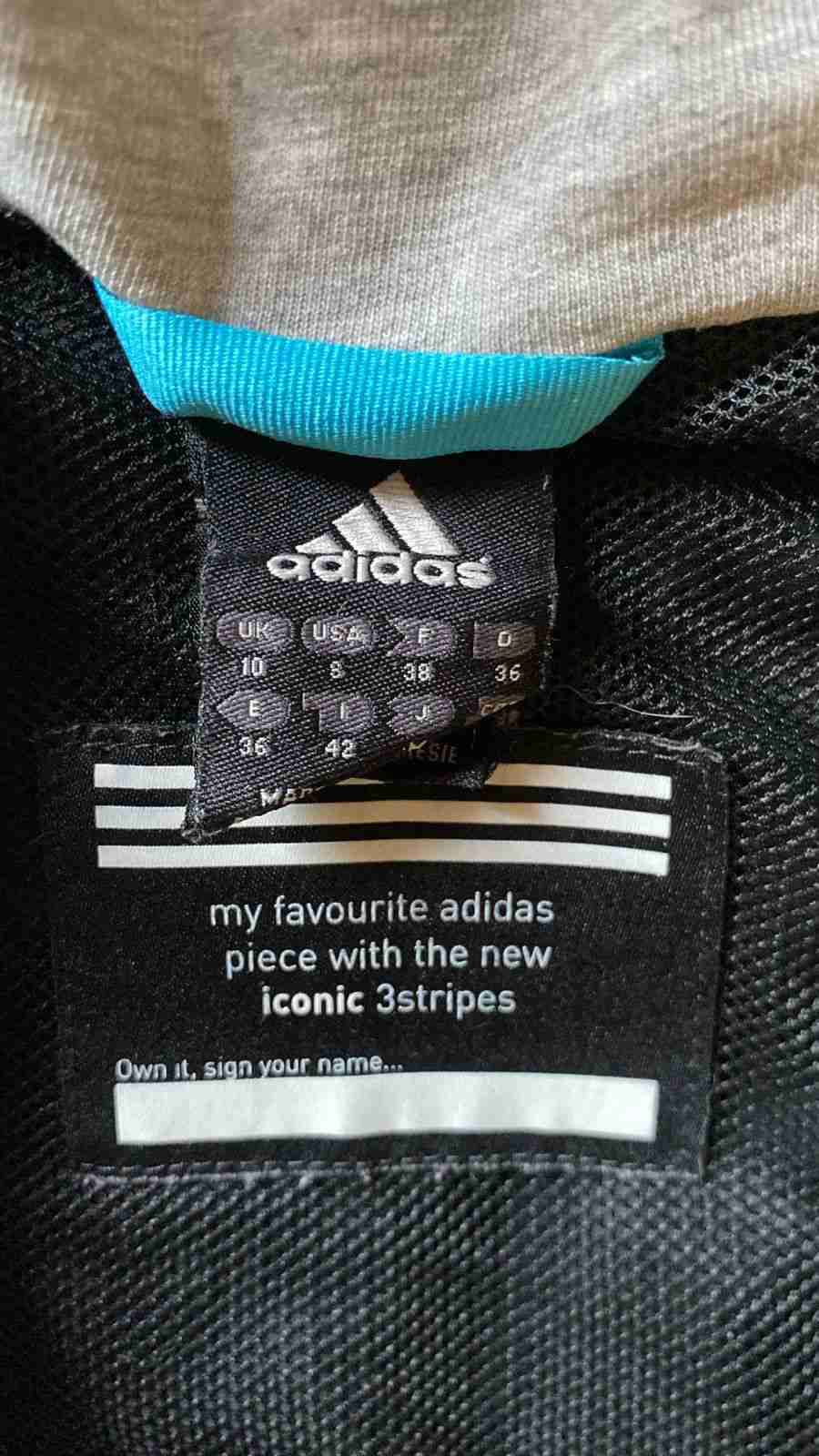 Cortaviento negro con capucha - miniatura 2