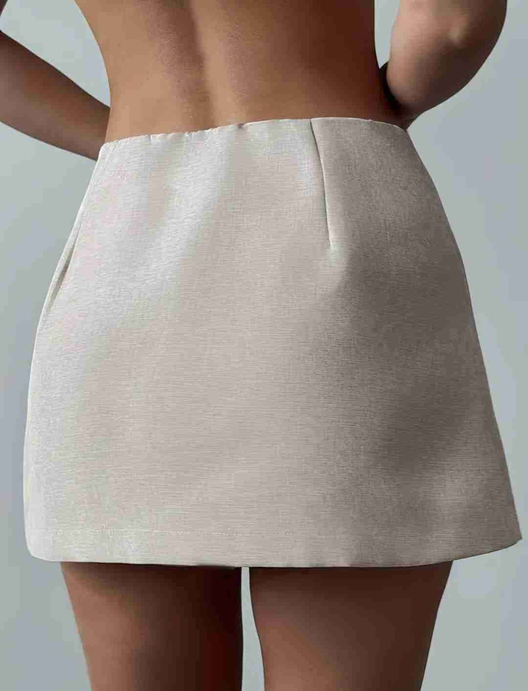 Mini falda beige elegante - miniatura 3