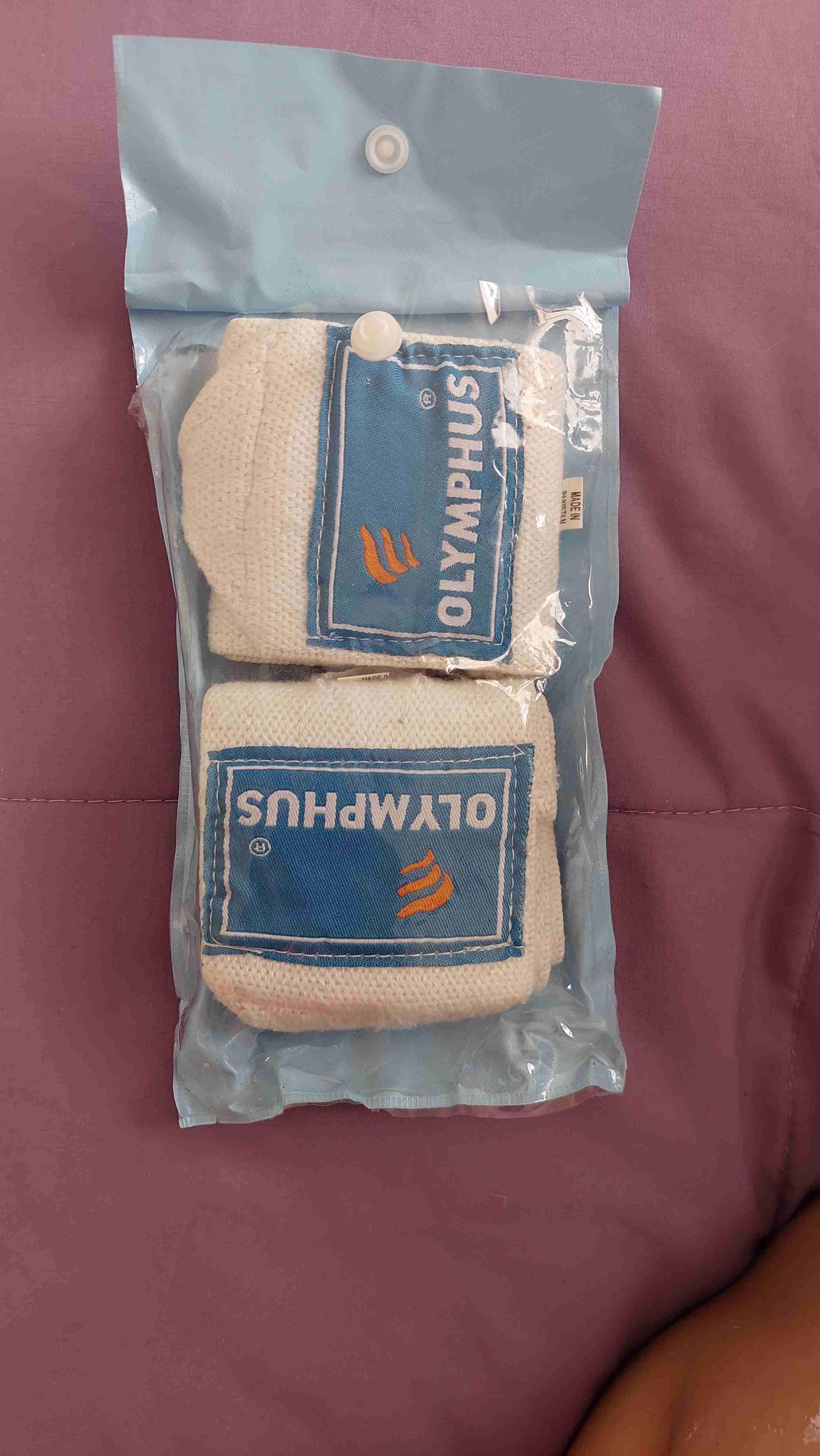 Muñequeras Olympus blancas - miniatura 1