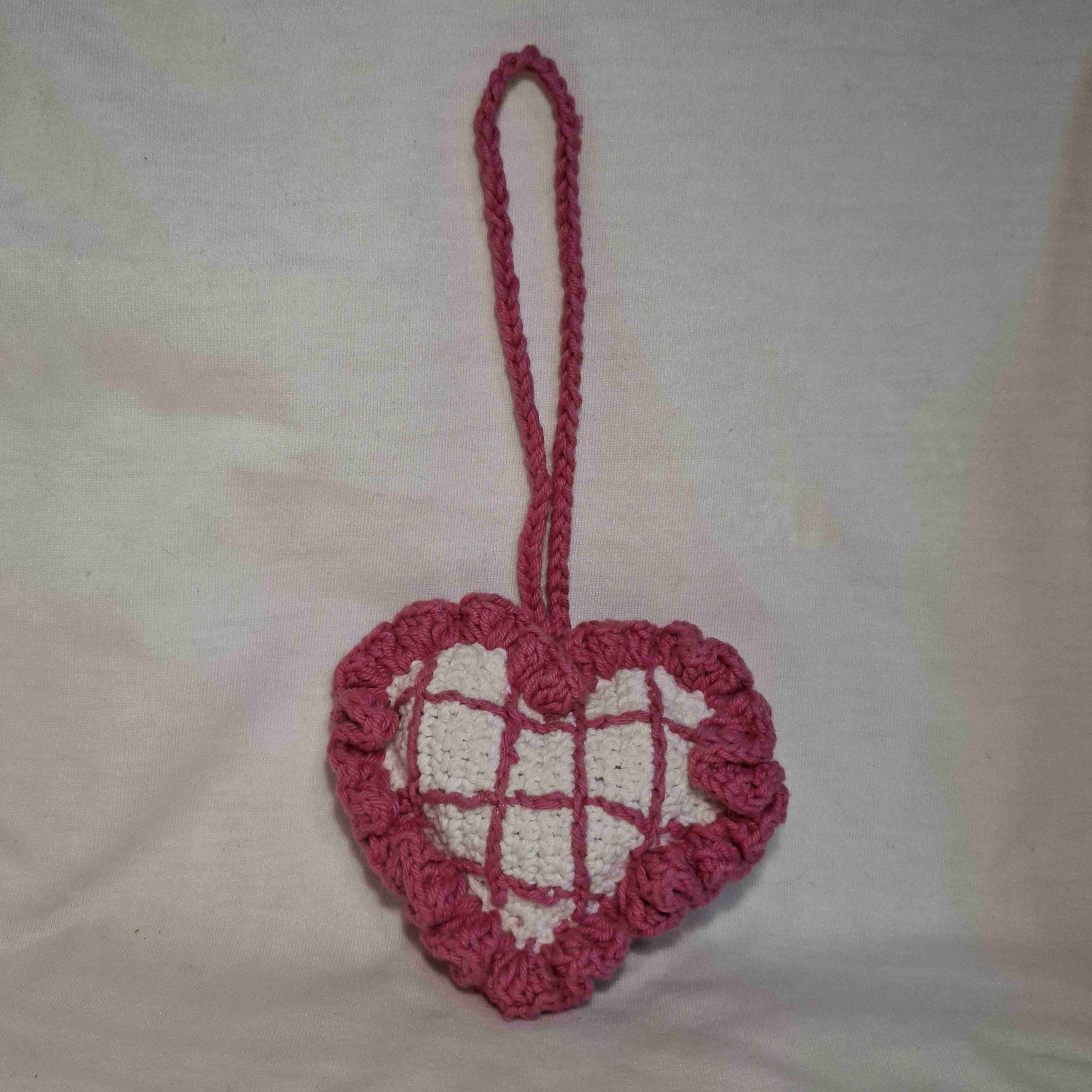 Adorno colgante tejido rosa