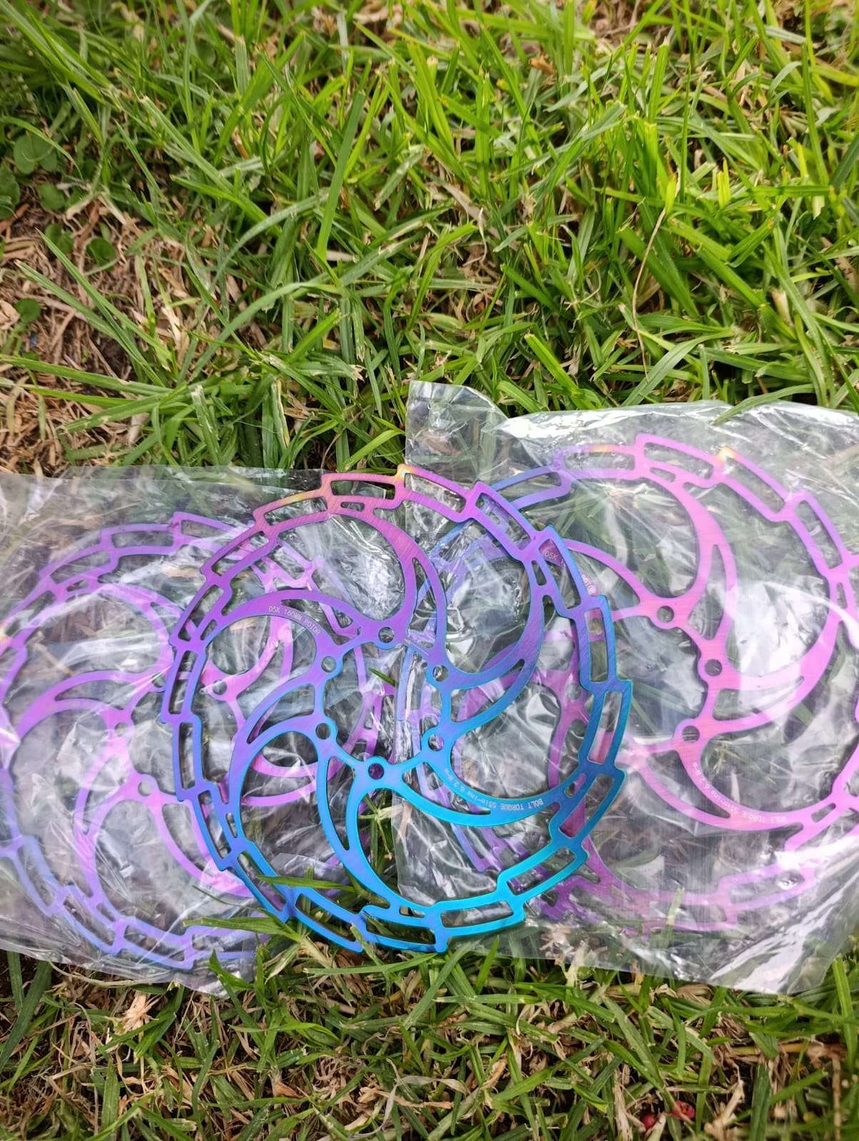 Discos de freno coloridos para bicicleta