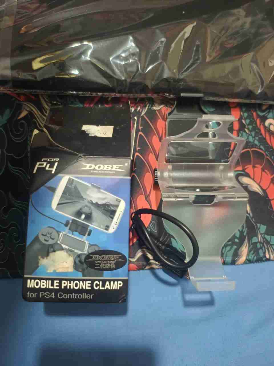 Soporte Clip para Control PS4 (Dobe) - miniatura 1