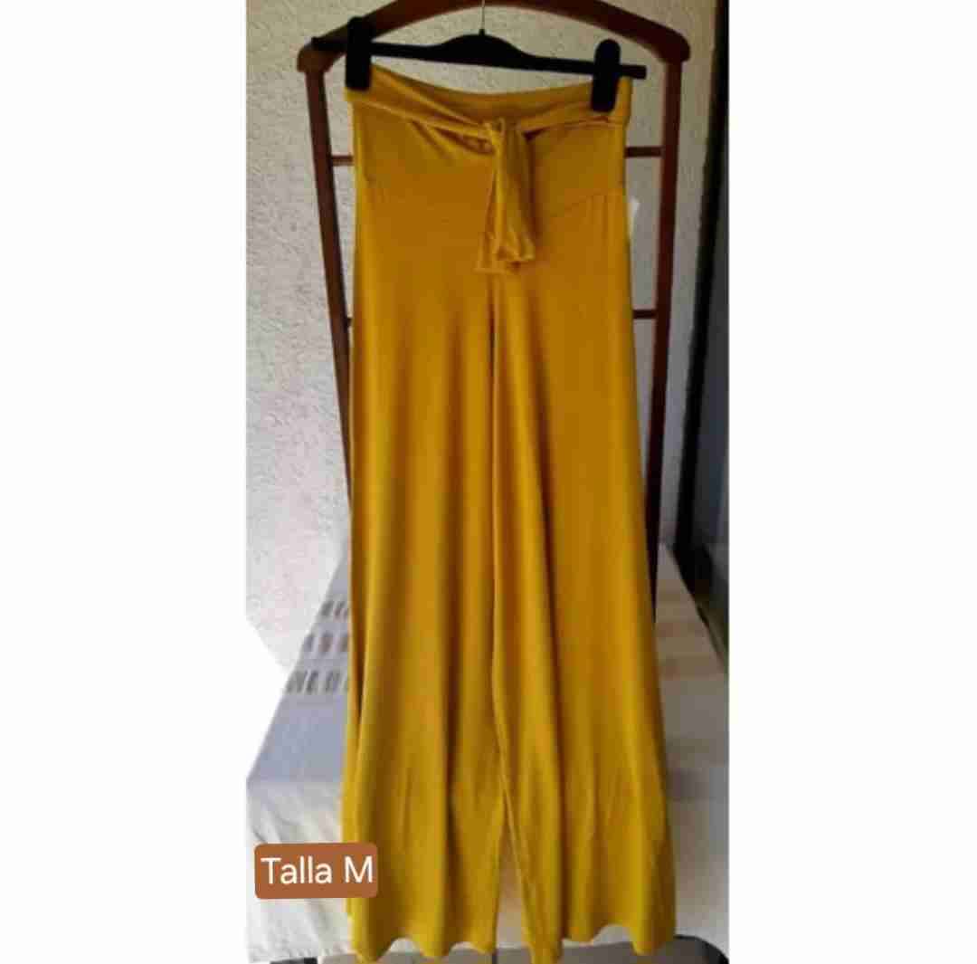 Pantalones anchos color mostaza PALAZZO
