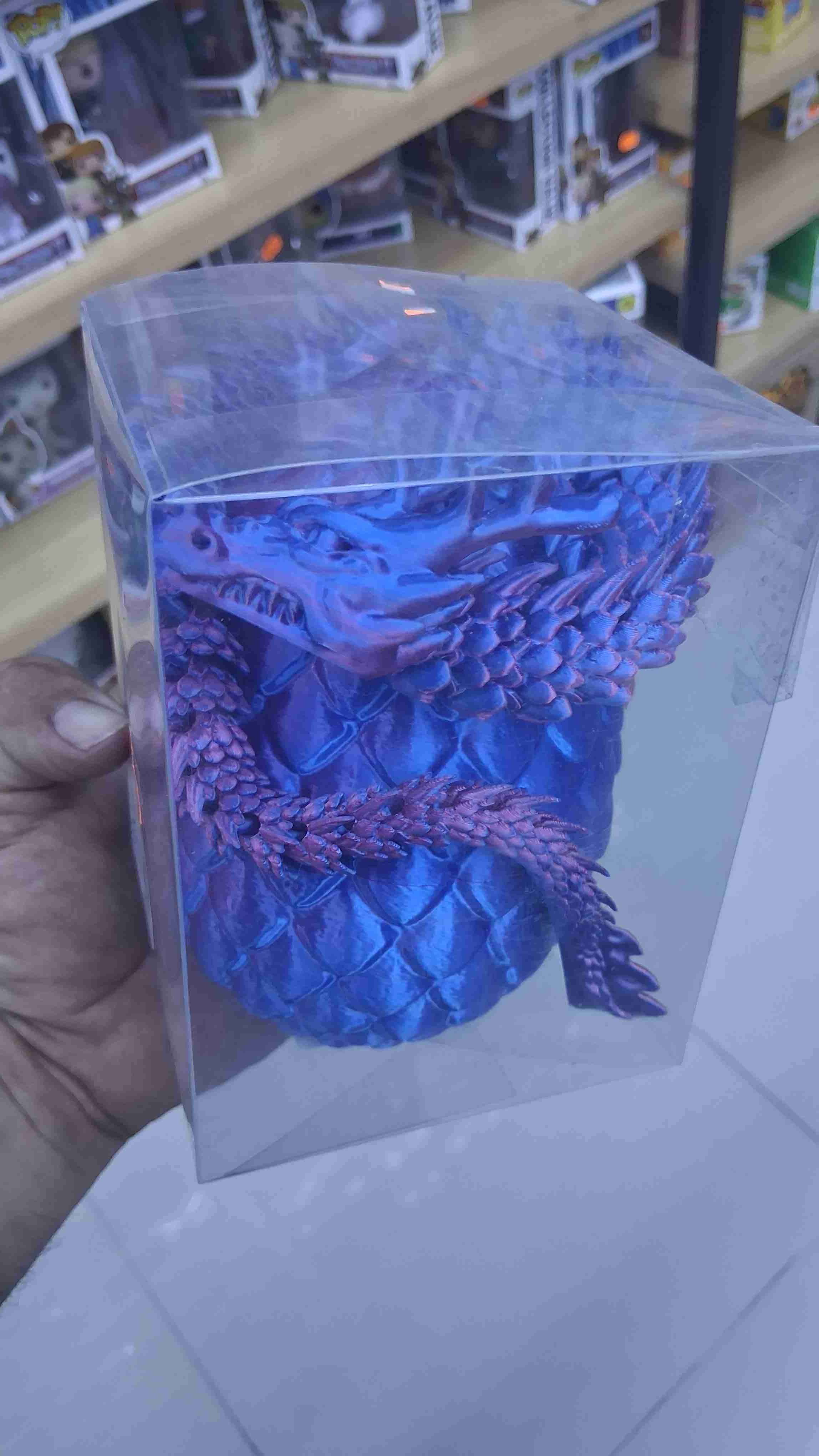 Figura decorativa de dragón azul