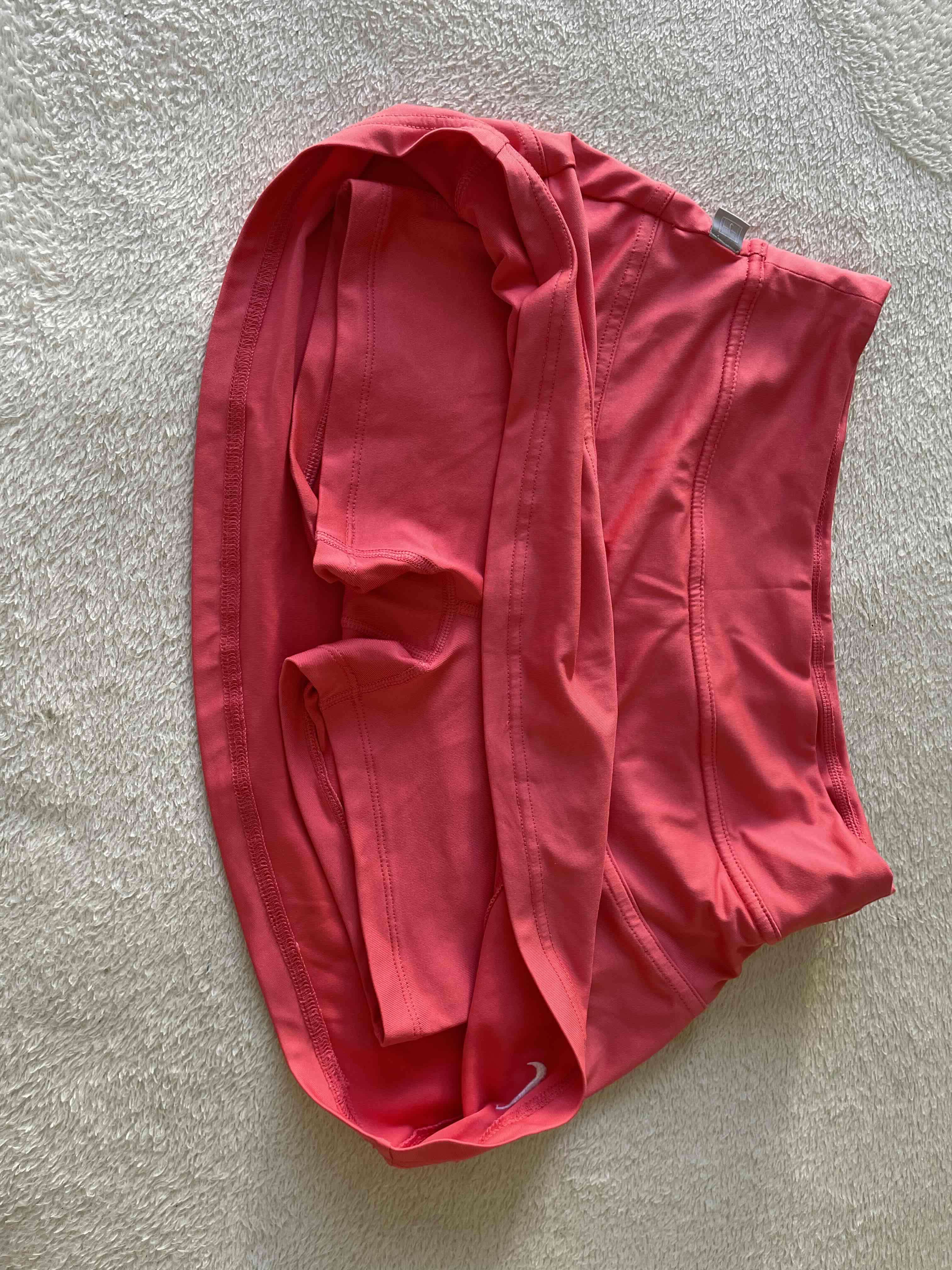 Short pollera rosa Nike - miniatura 1