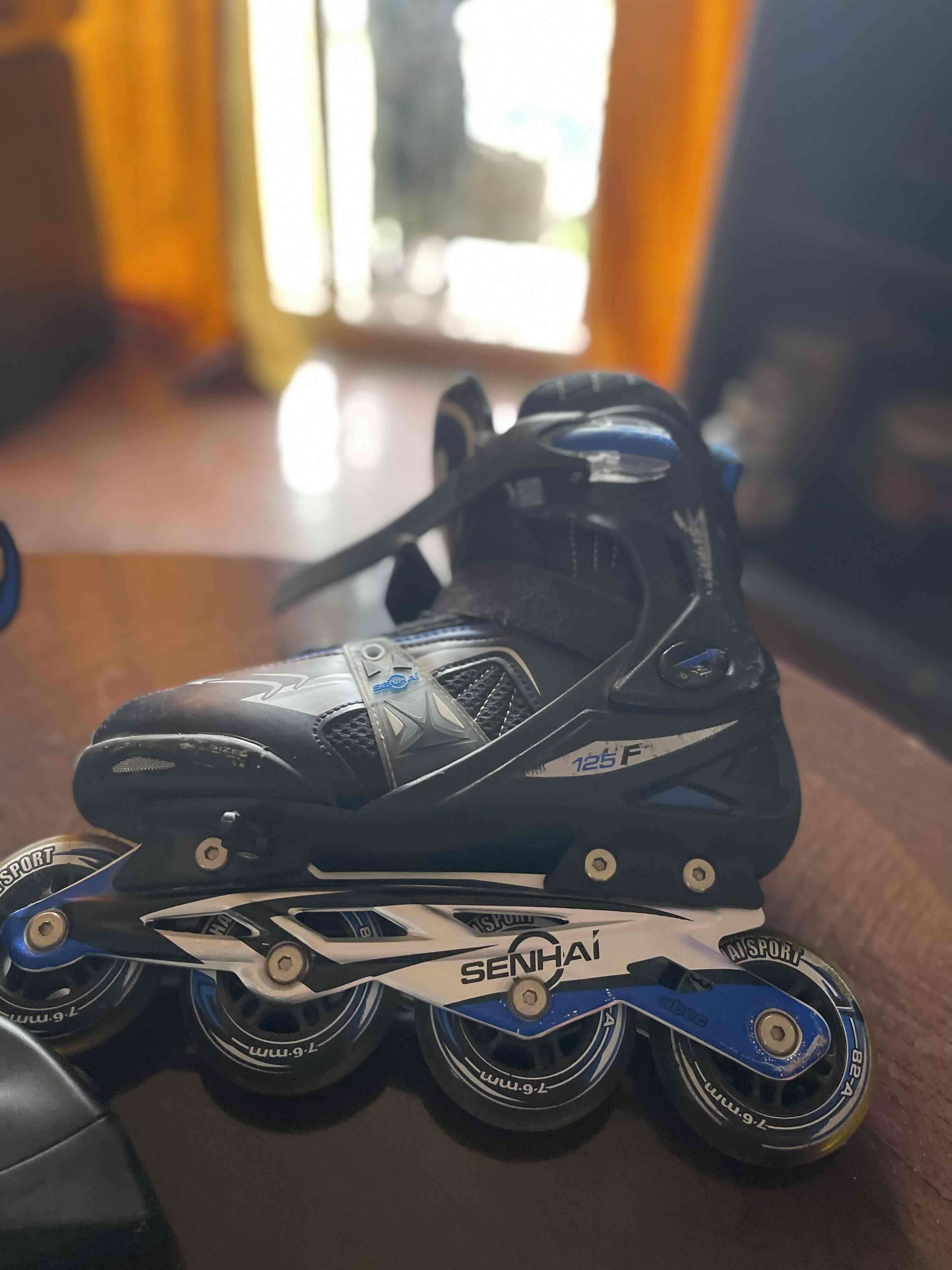 Patines en línea negro y azul - miniatura 2