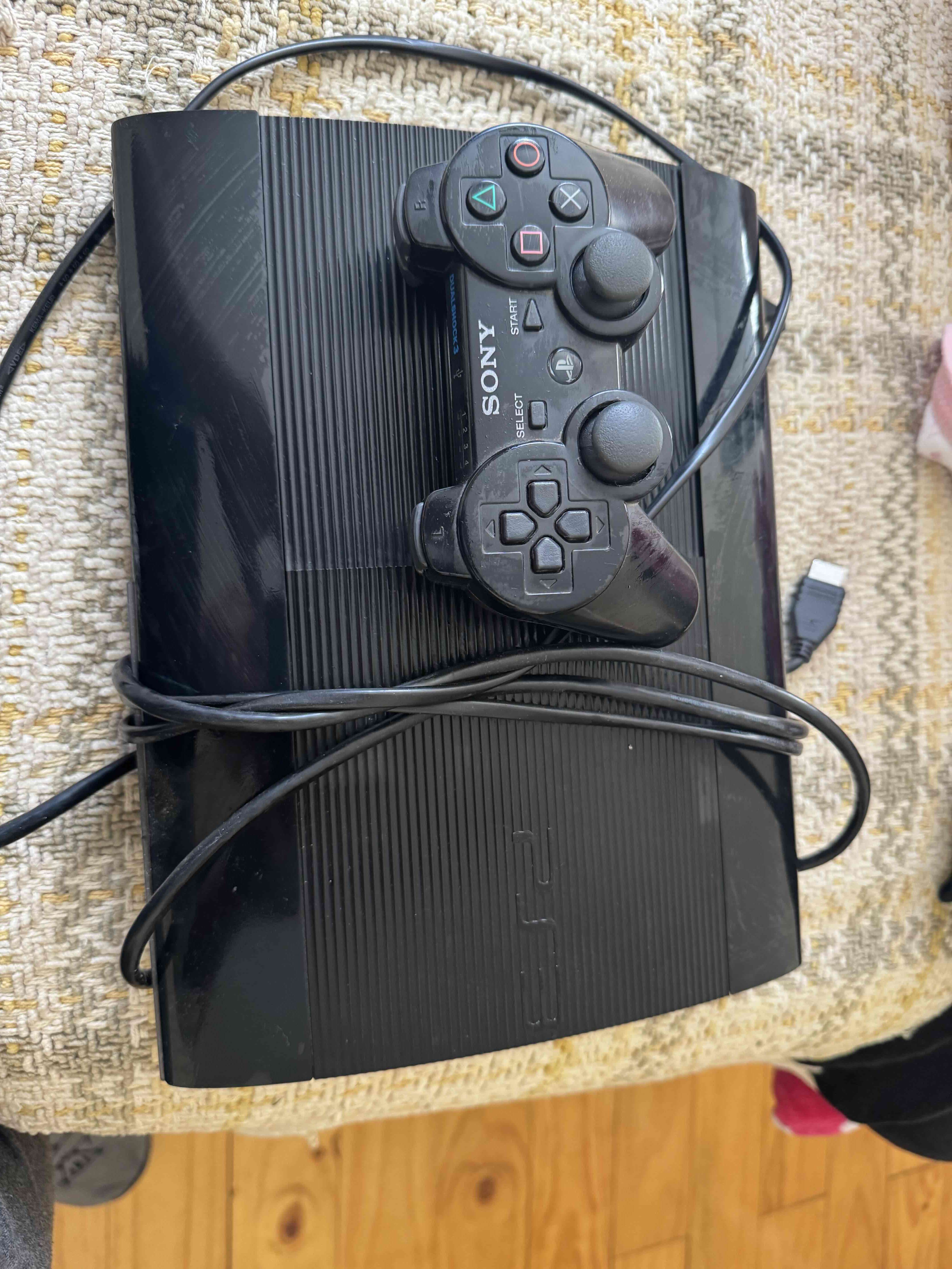 Consola PS3 con control - miniatura 1