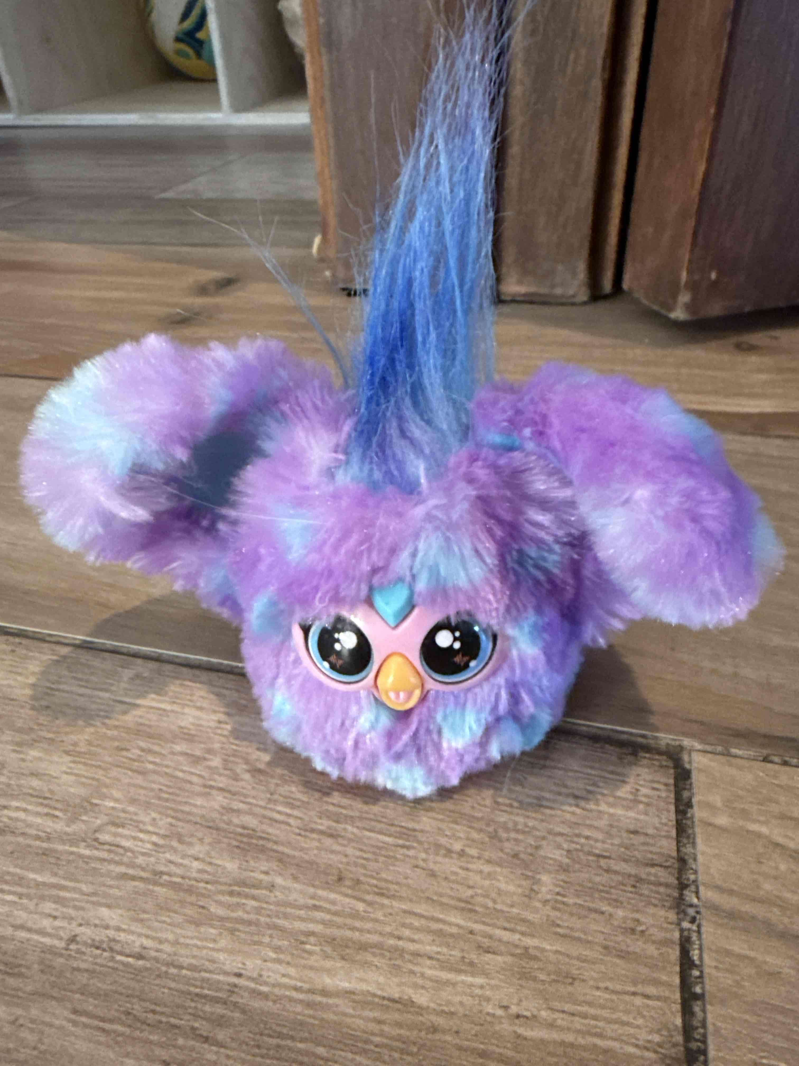 Pequeño juguete morado - miniatura 2