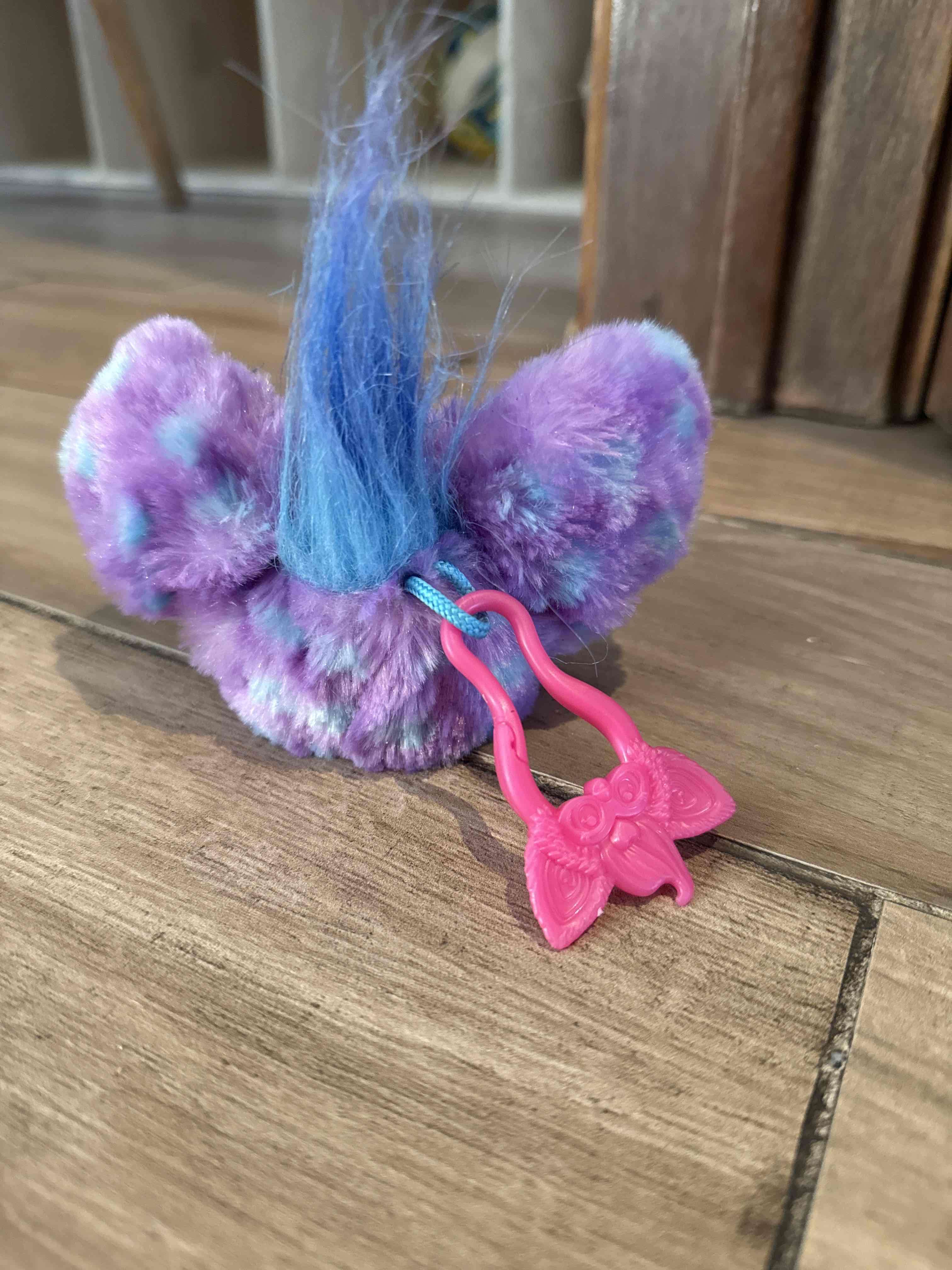 Pequeño juguete morado - miniatura 3