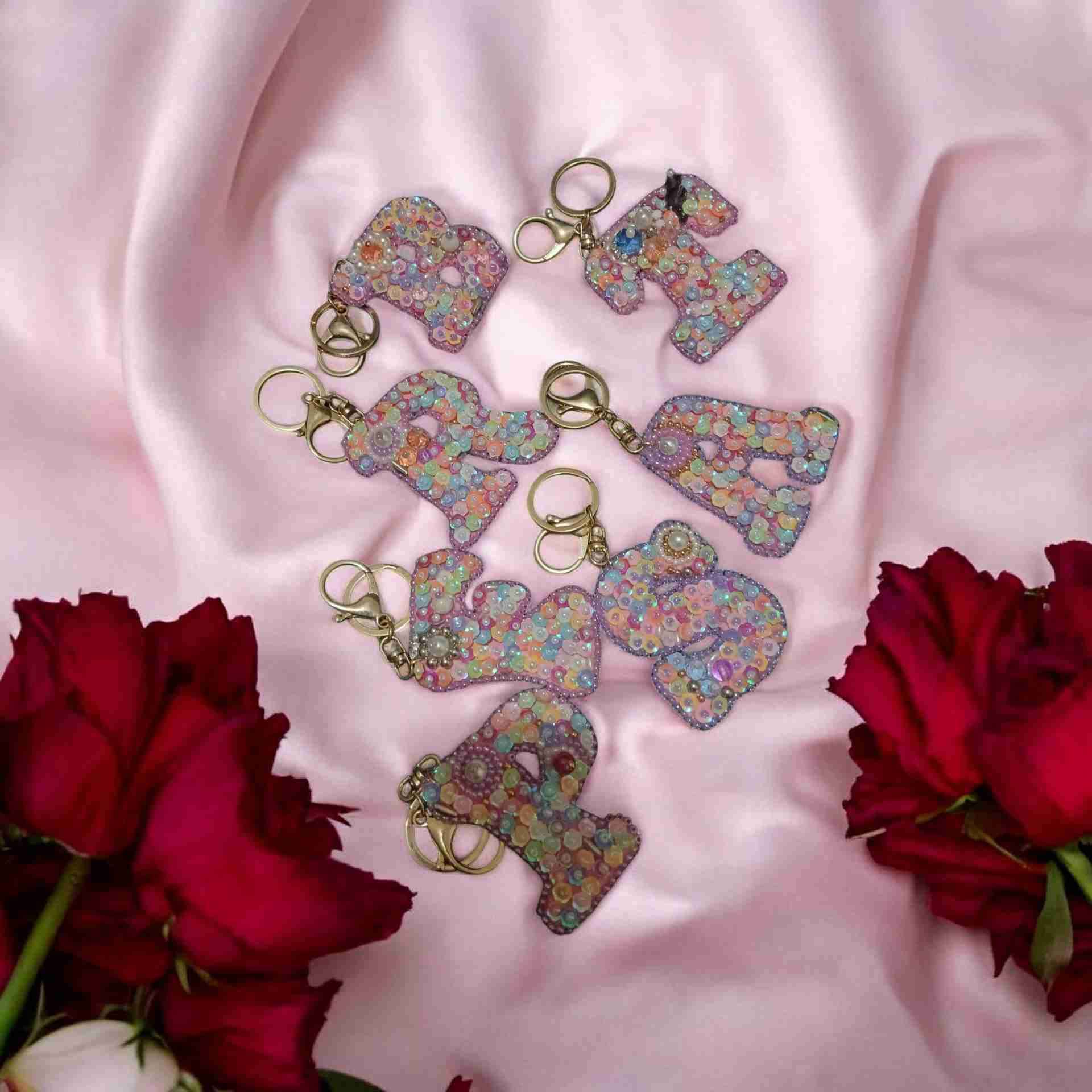 Llaveros decorativos con lentejuelas - miniatura 1