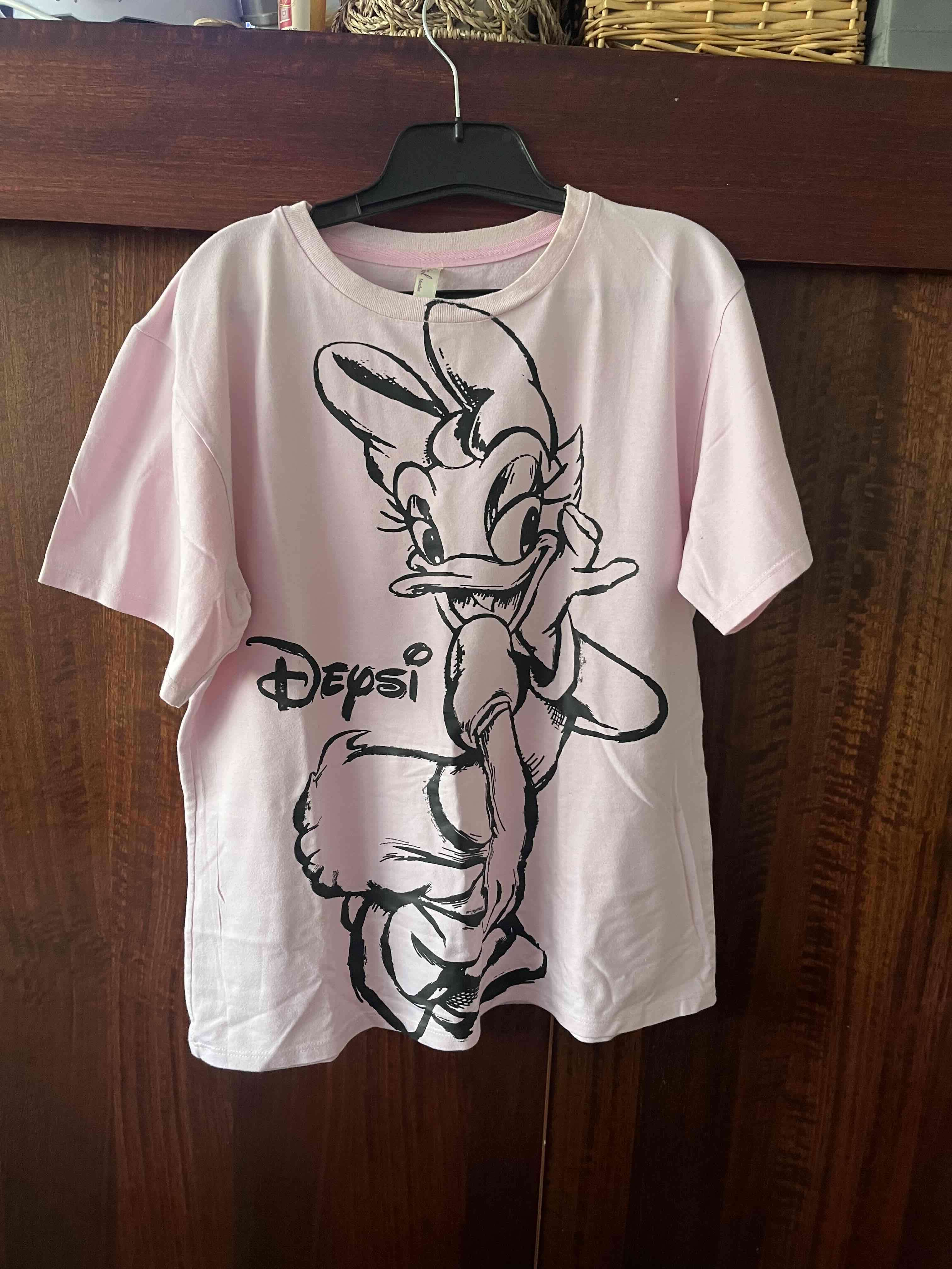 Polera rosa con dibujo de pato - miniatura 1