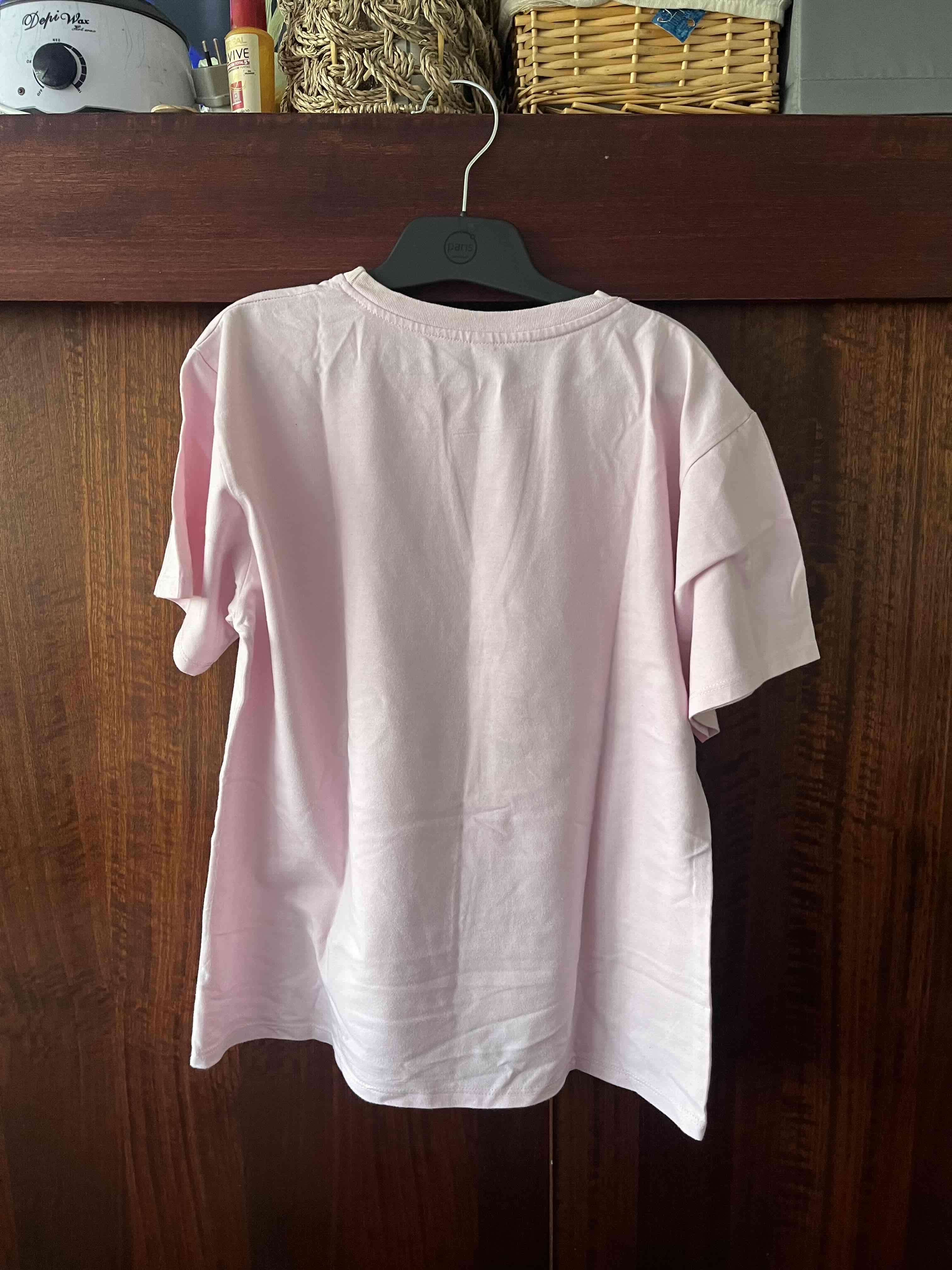 Polera rosa con dibujo de pato - miniatura 2