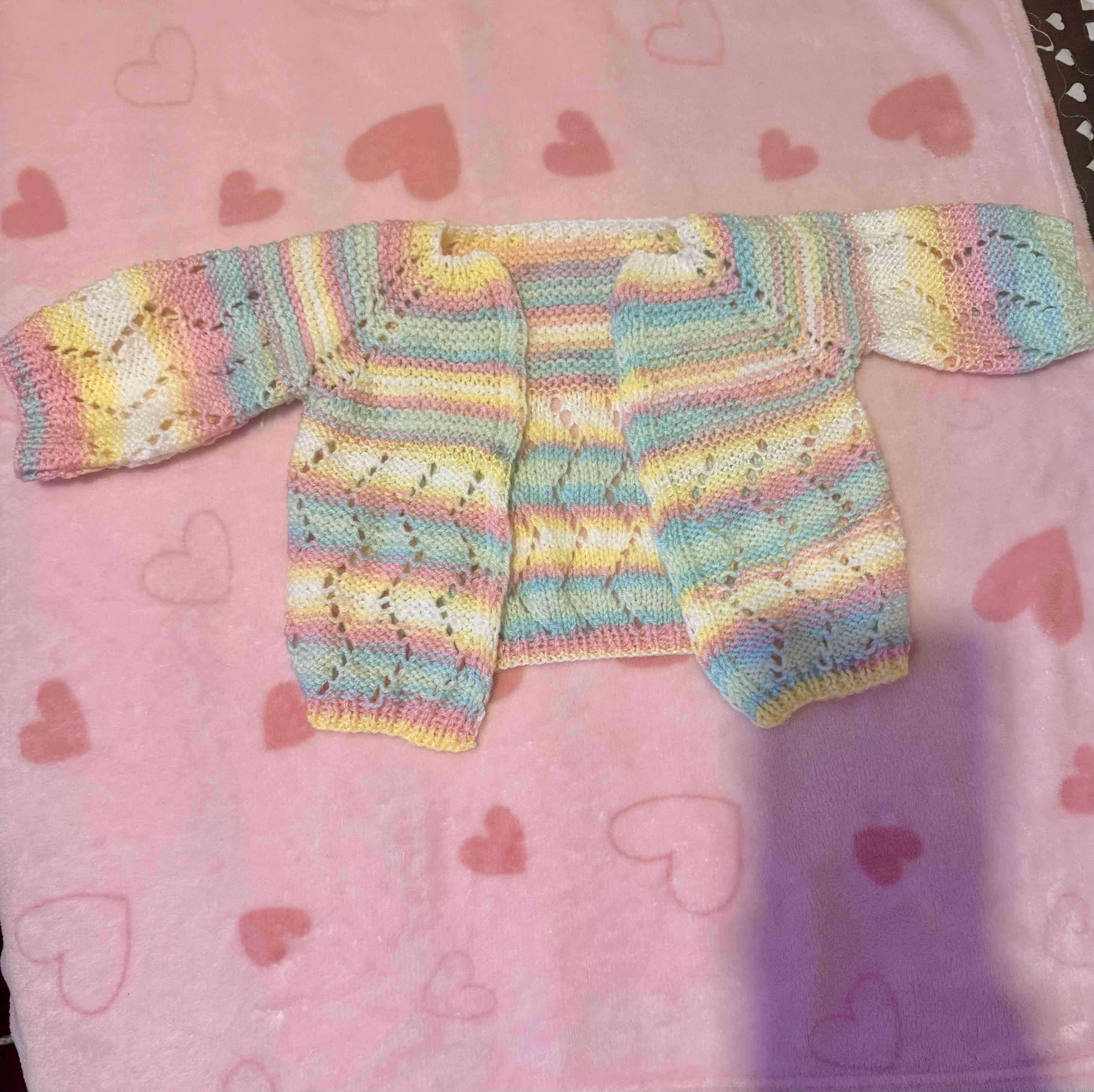 Chaleco bebé tejido a mano multicolor