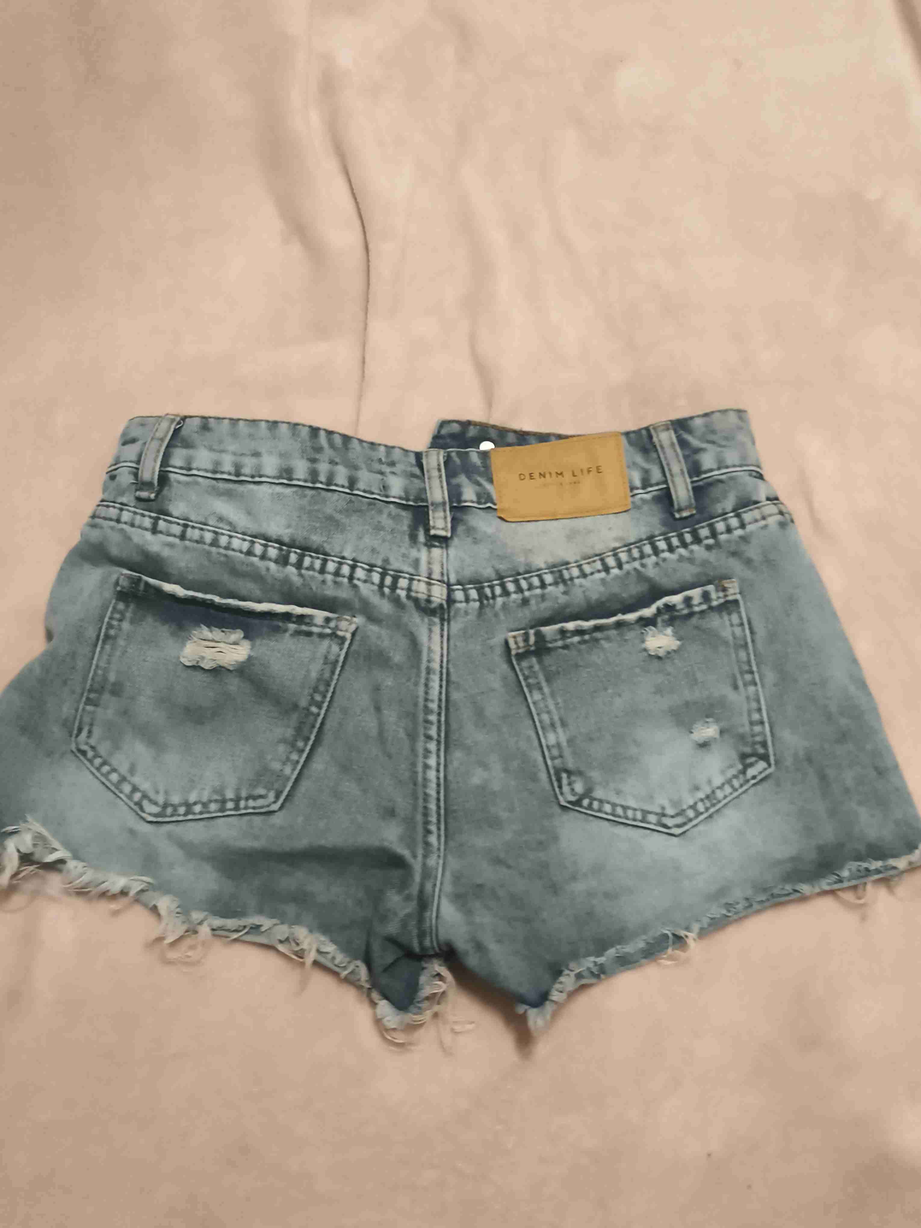 Shorts de mezclilla rasgados - miniatura 2