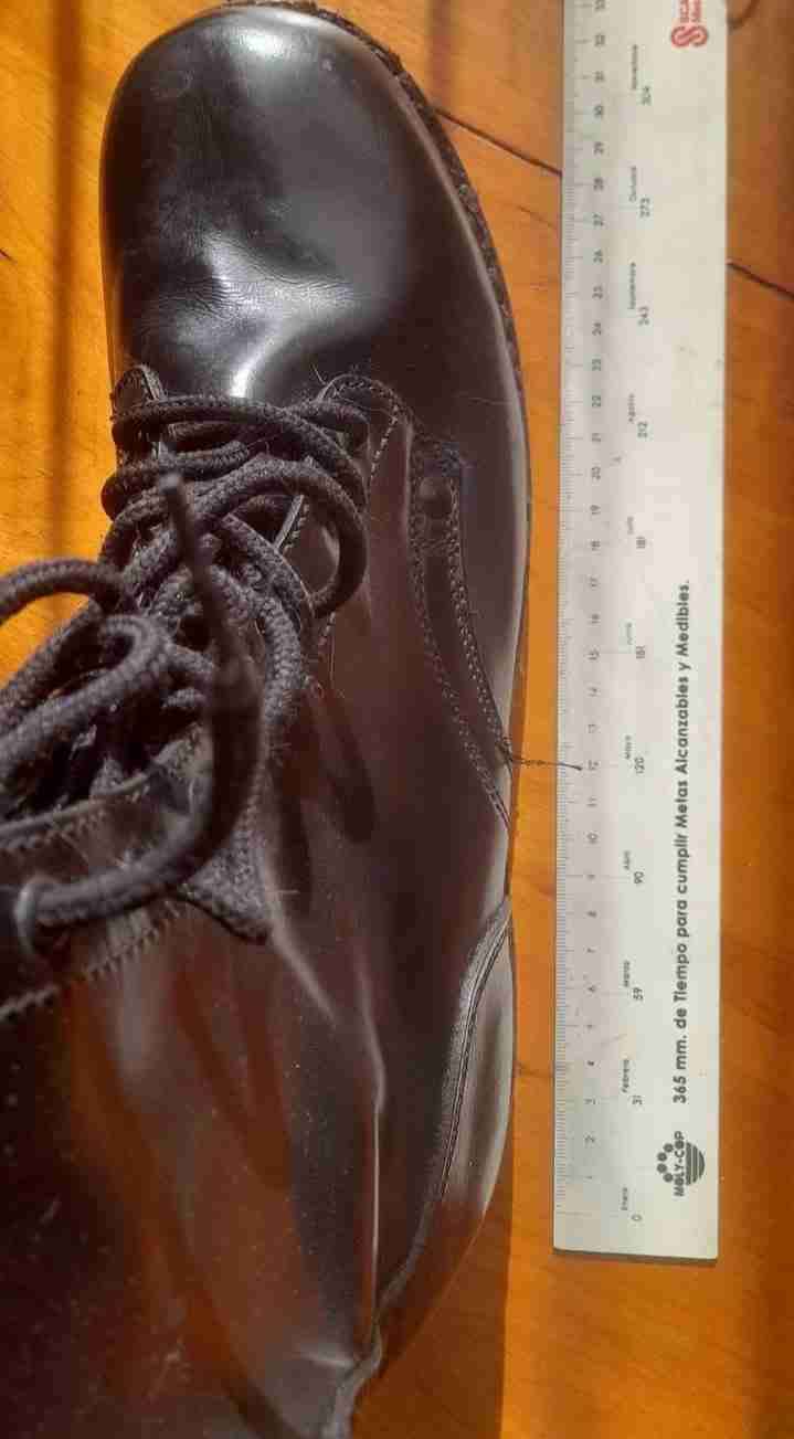 Botas negras de cuero - miniatura 1
