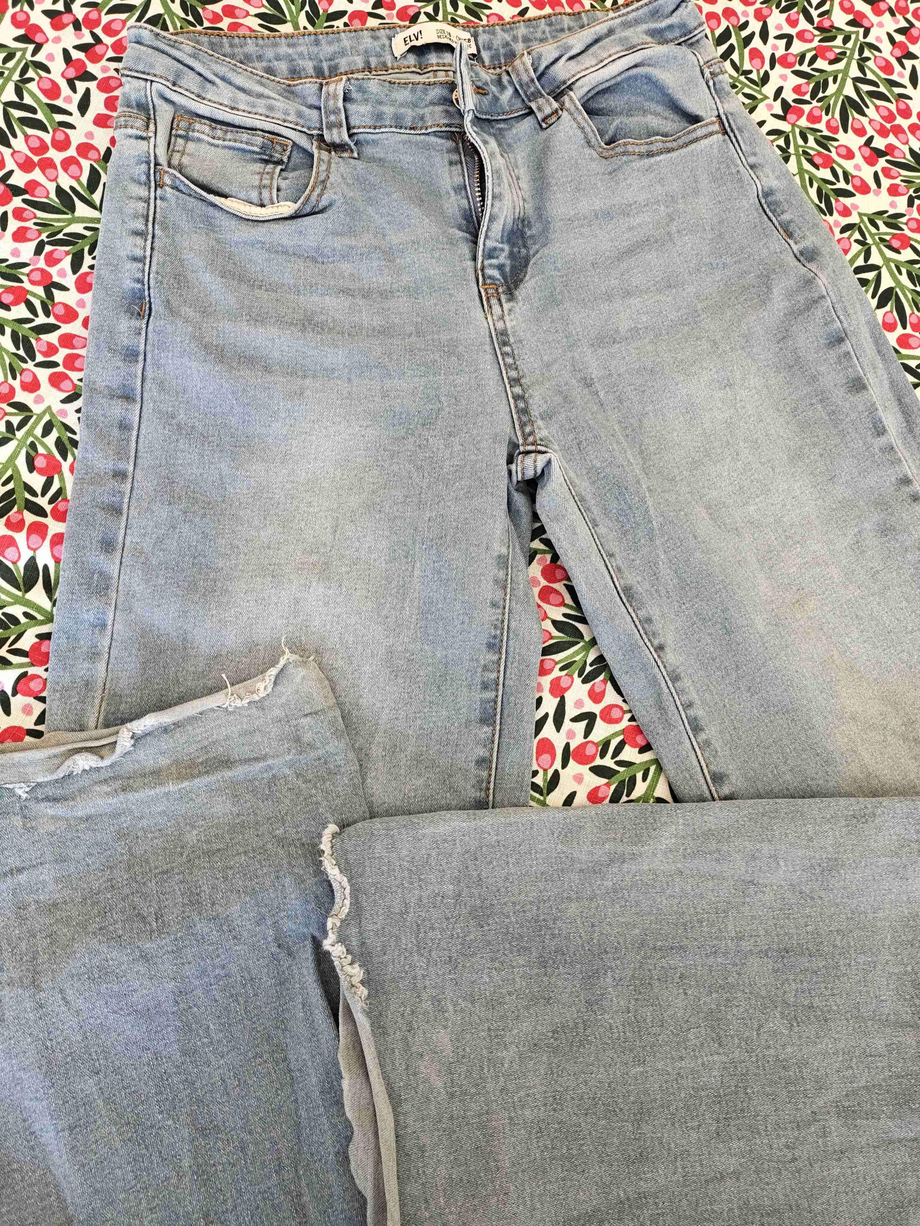 Jeans celestes con detalles desgastados (Talla 16) - miniatura 1