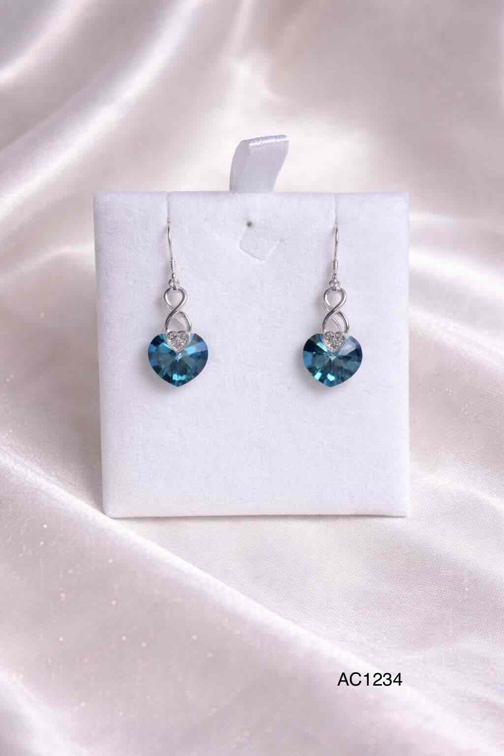 Aros Swarovski colgantes con corazón azul
