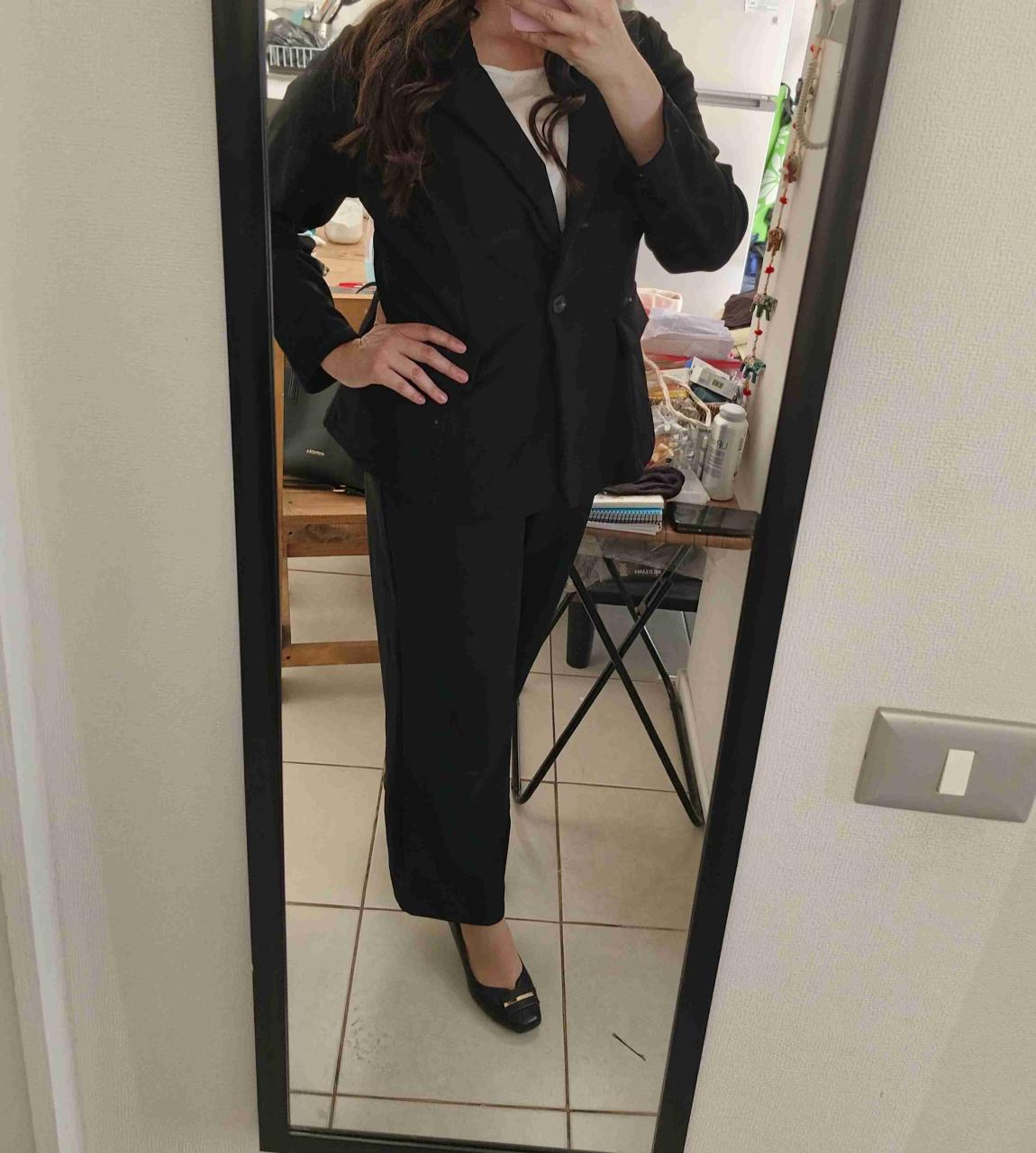 Traje negro de mujer