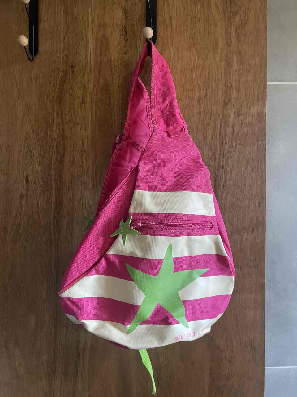 Mochila rosada con estrellas - miniatura 1