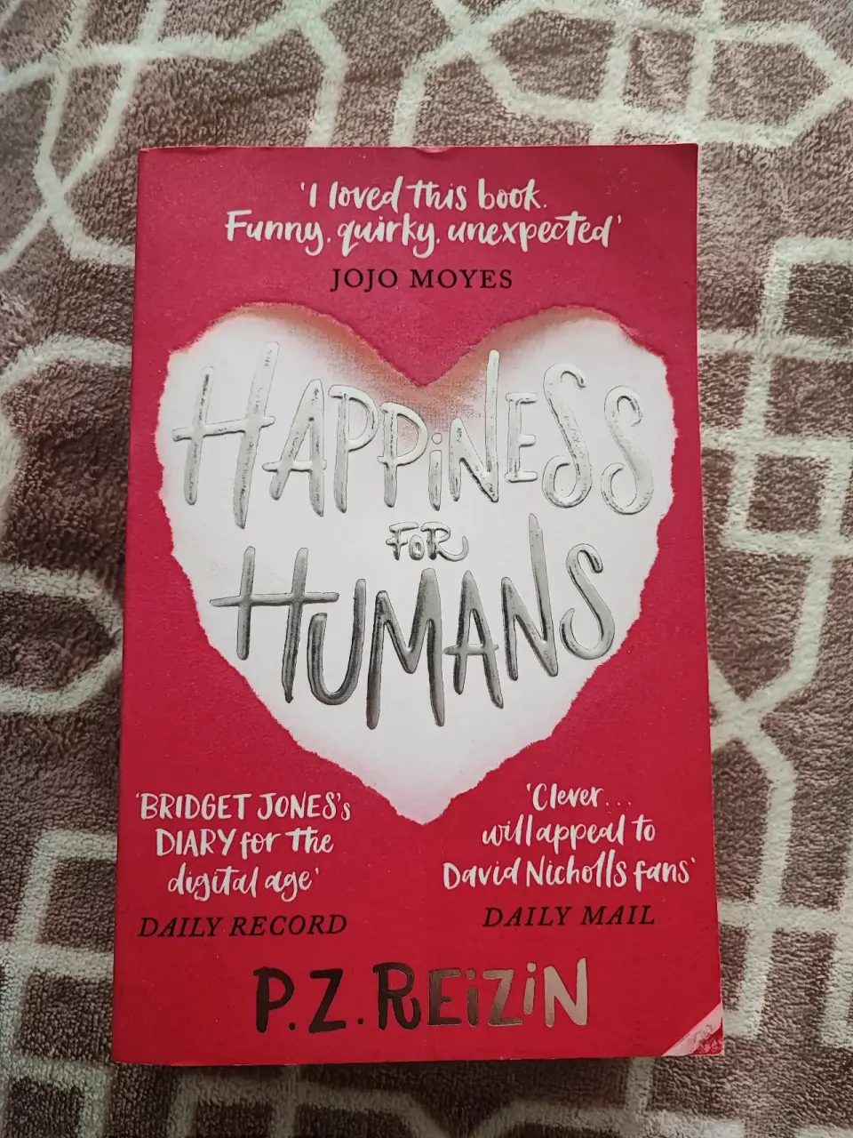 Libro 'Happiness for Humans' - miniatura 1