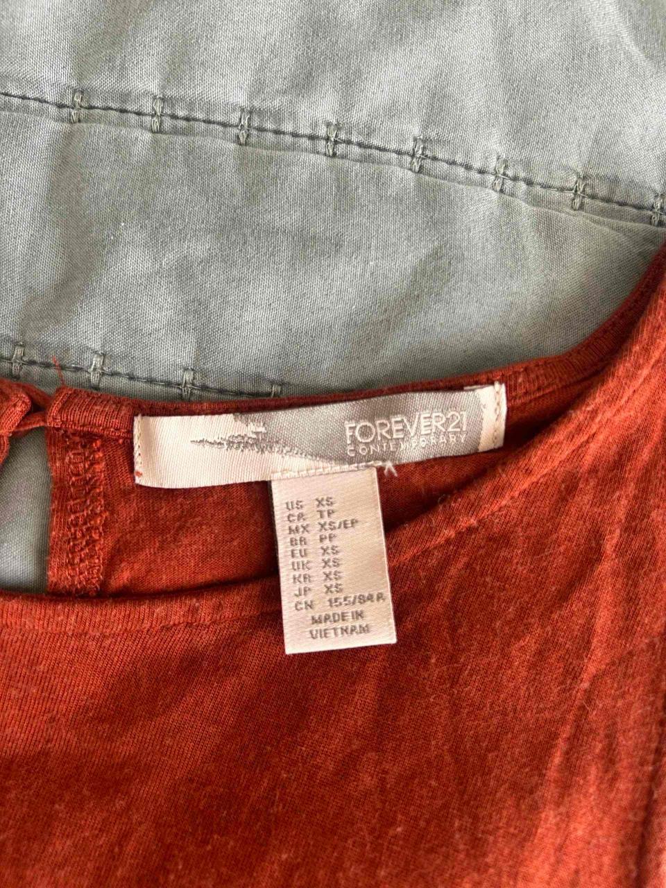 Polera sin mangas naranja - miniatura 2