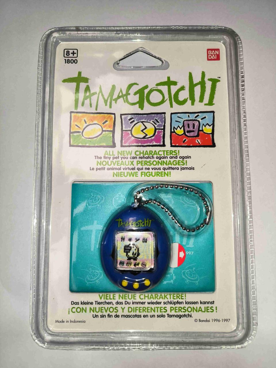 Tamagotchi azul nuevo en paquete 1997 - miniatura 1