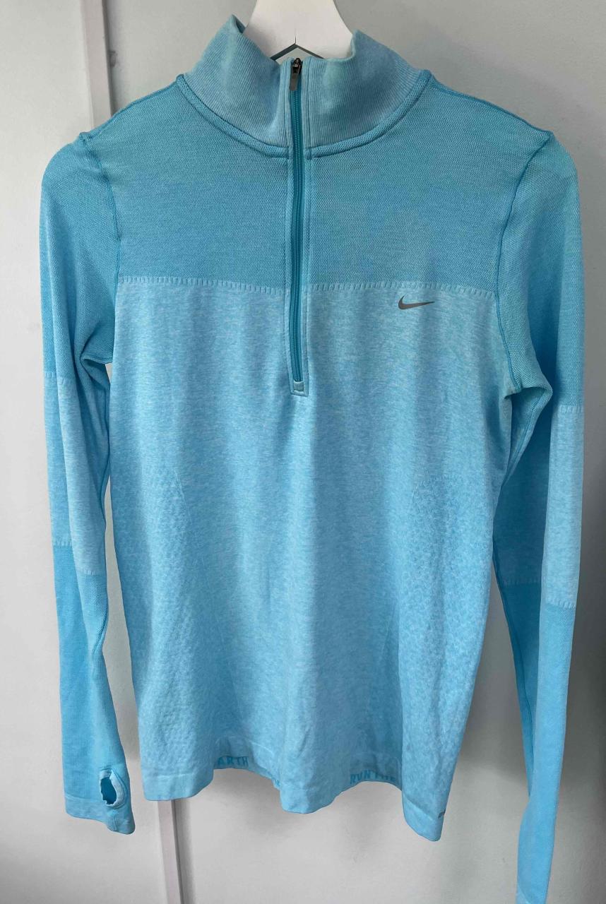 Polerón deportivo azul claro marca Nike - miniatura 2