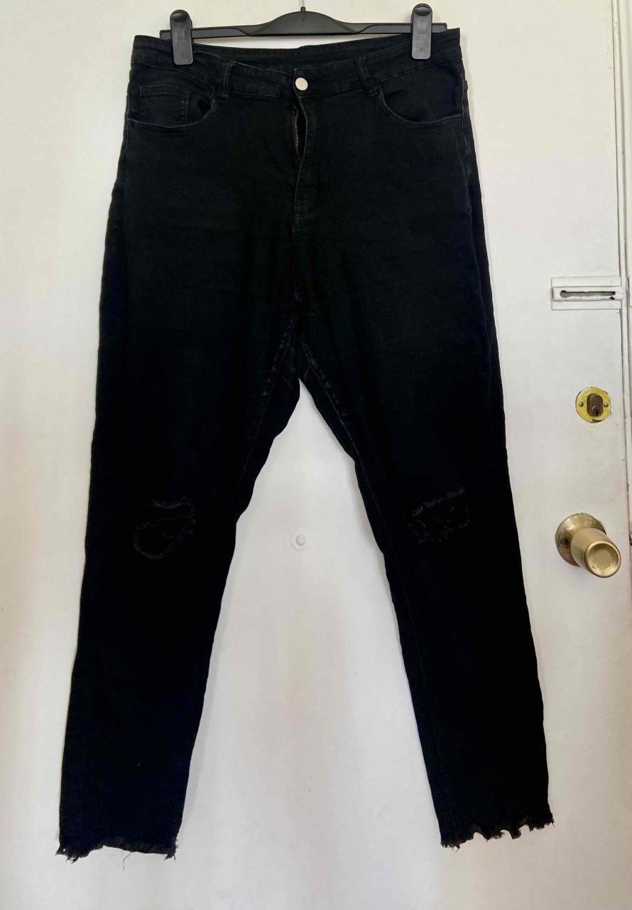 Jeans negros desgastados