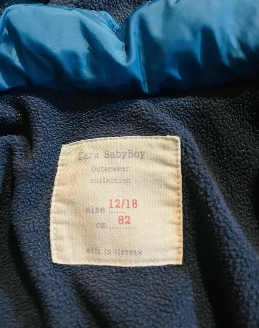 Chaqueta acolchada azul para niños - miniatura 2